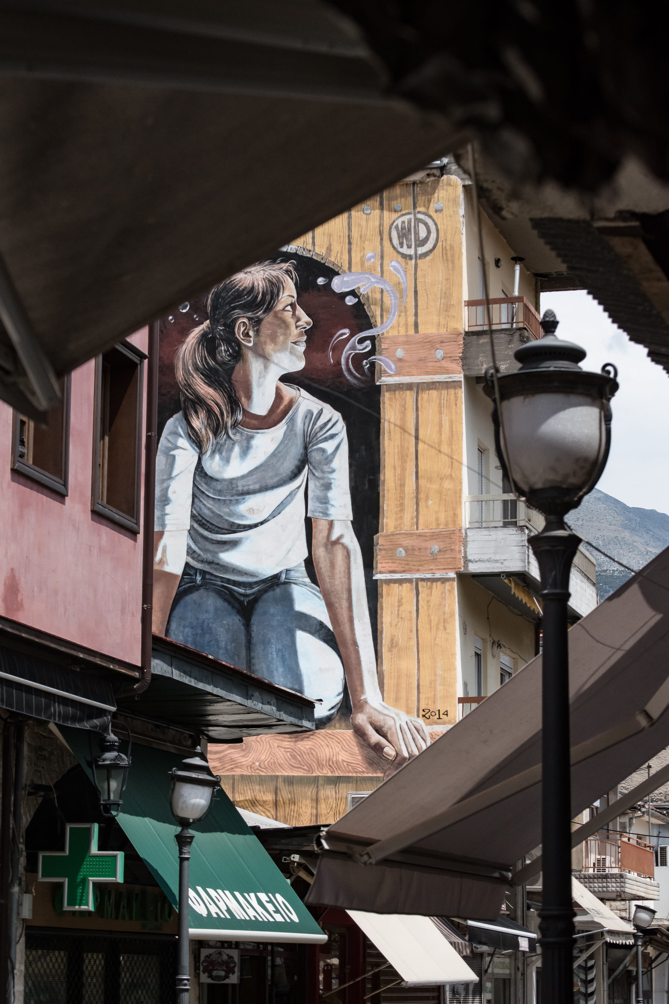 casual clothing, street, graffiti, front view, low angle view, women, mid adult, architecture, built structure, outdoors, art, human representation, street art, Phone HD Wallpaper