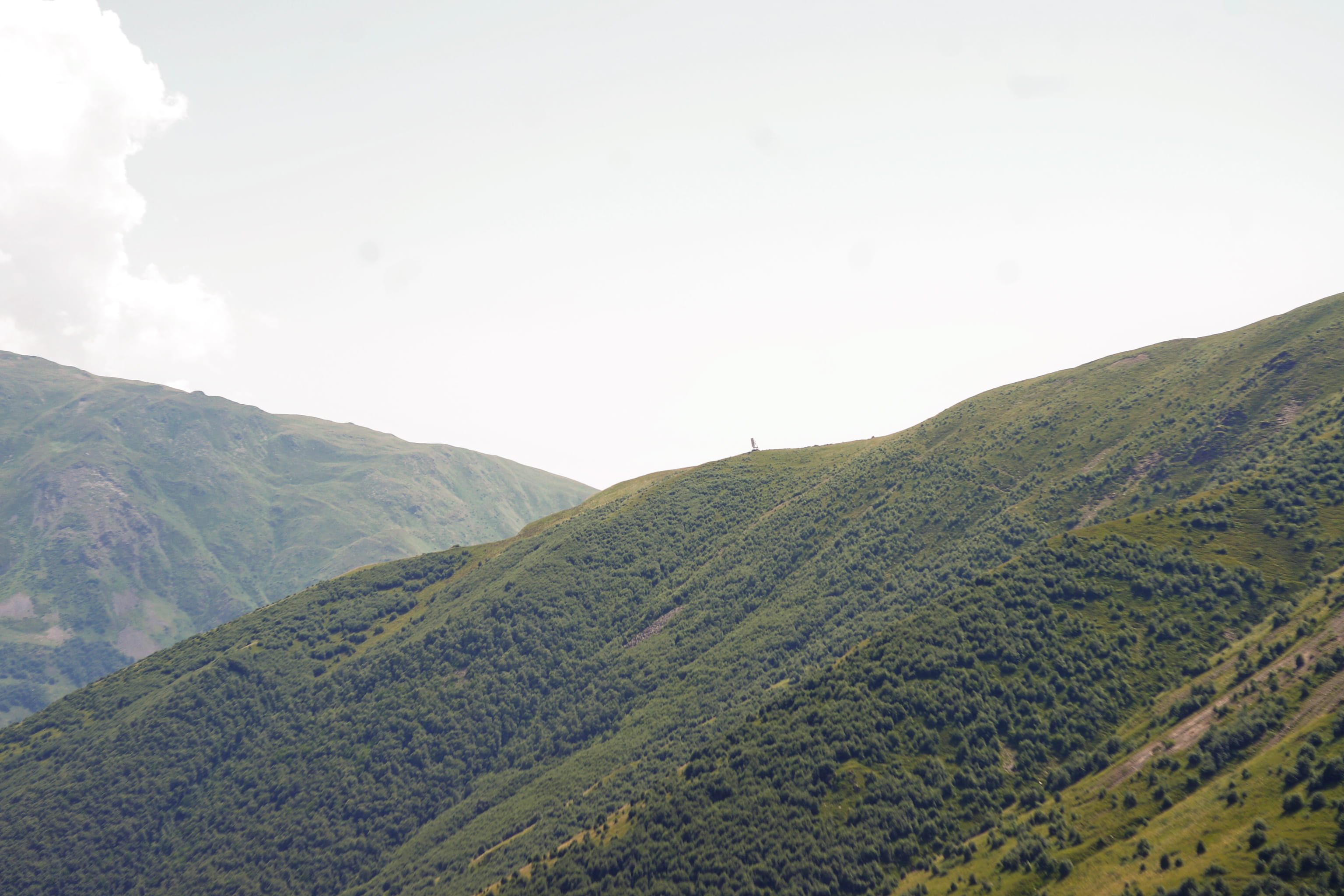 no people, non-urban scene, mountain range, green color, sky, land, cloud - sky, tranquil scene, outdoors, rolling landscape, stepantsminda, environment, HD Wallpaper