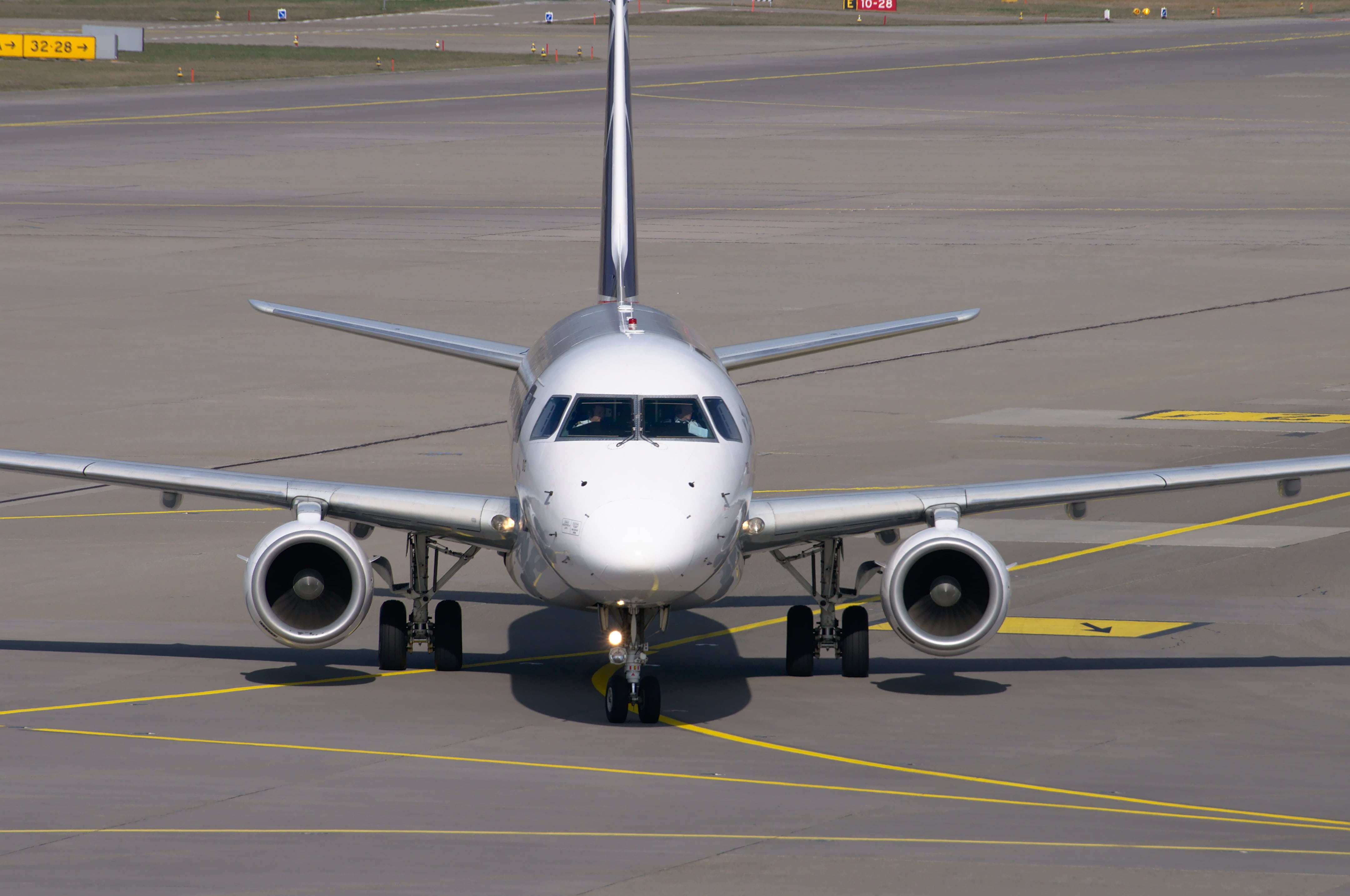 land vehicle, white, travel, air vehicle, airport, lot, journey, aircraft, no people, airport runway, 4K, transportation, corporate jet, front view, outdoors, HD Wallpaper
