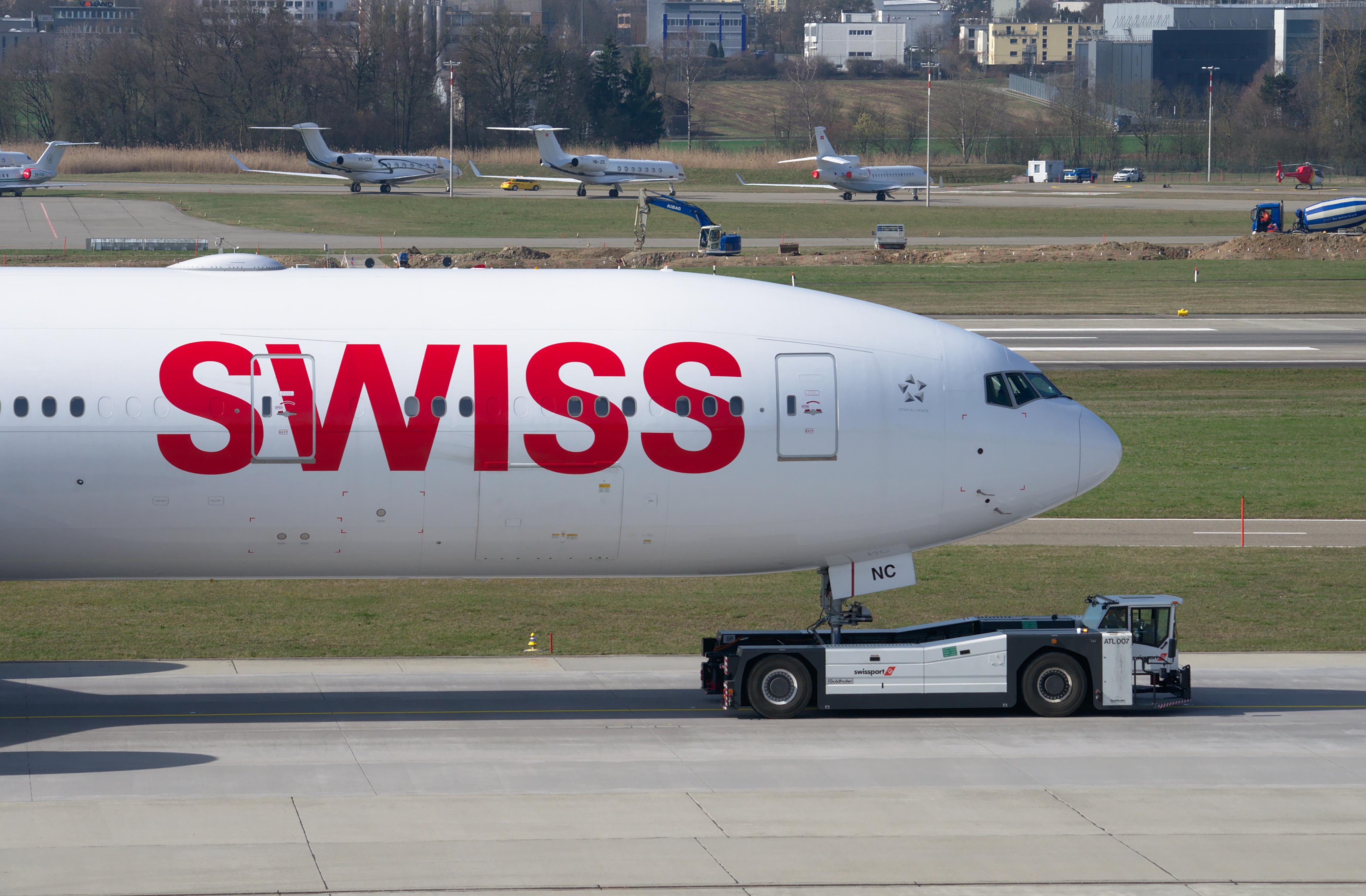 white color, road, tug, communication, stationary, towing vehicle, aircraft, zurich, sign, swiss airlines, travel, no people, 4K, day, text, air vehicle, HD Wallpaper