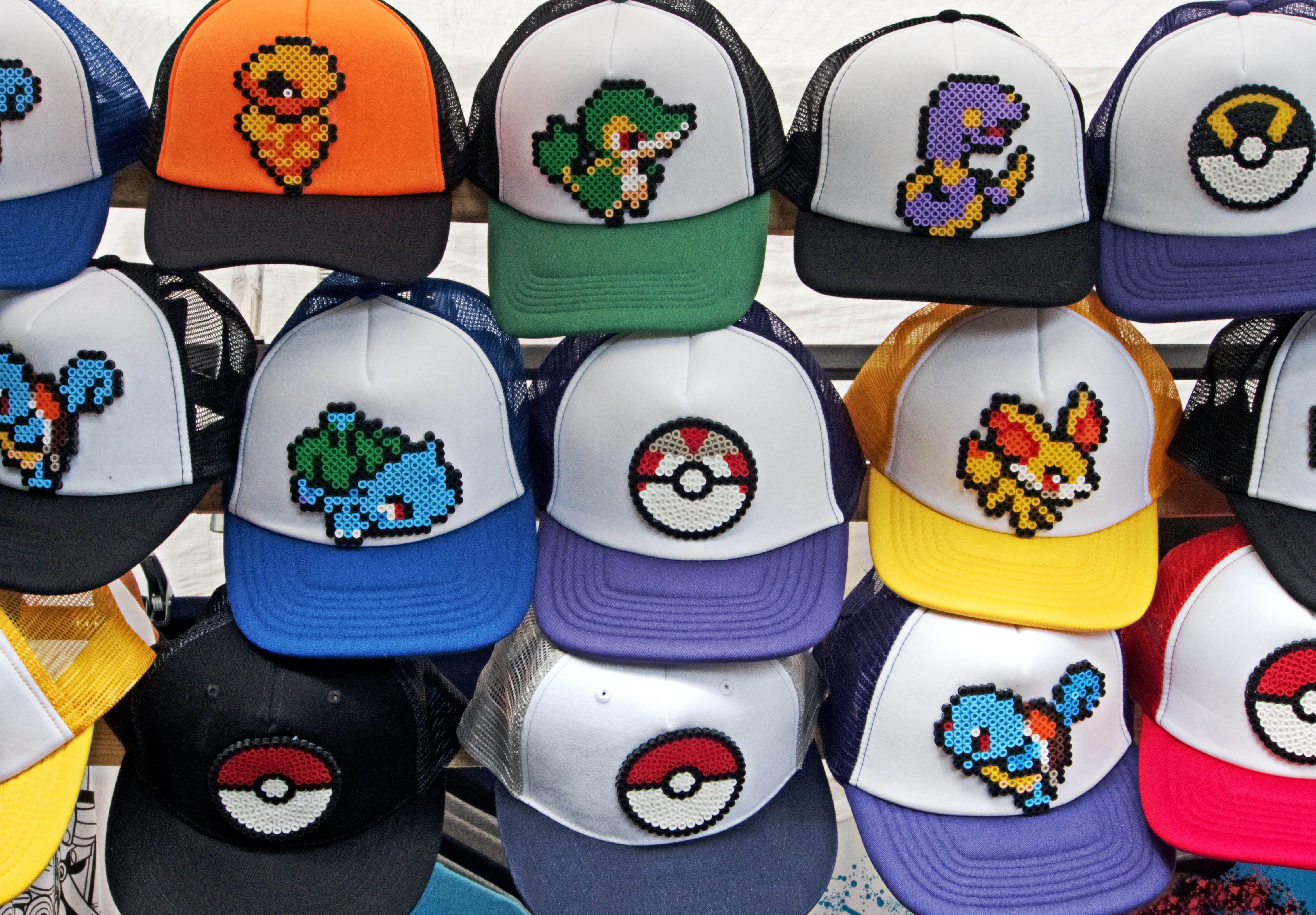 variation, baseball, indoors, pokemon go, high angle view, pile, market, collection, for sale, day, 4K, trucker, multi colored, color, still life, cap, HD Wallpaper