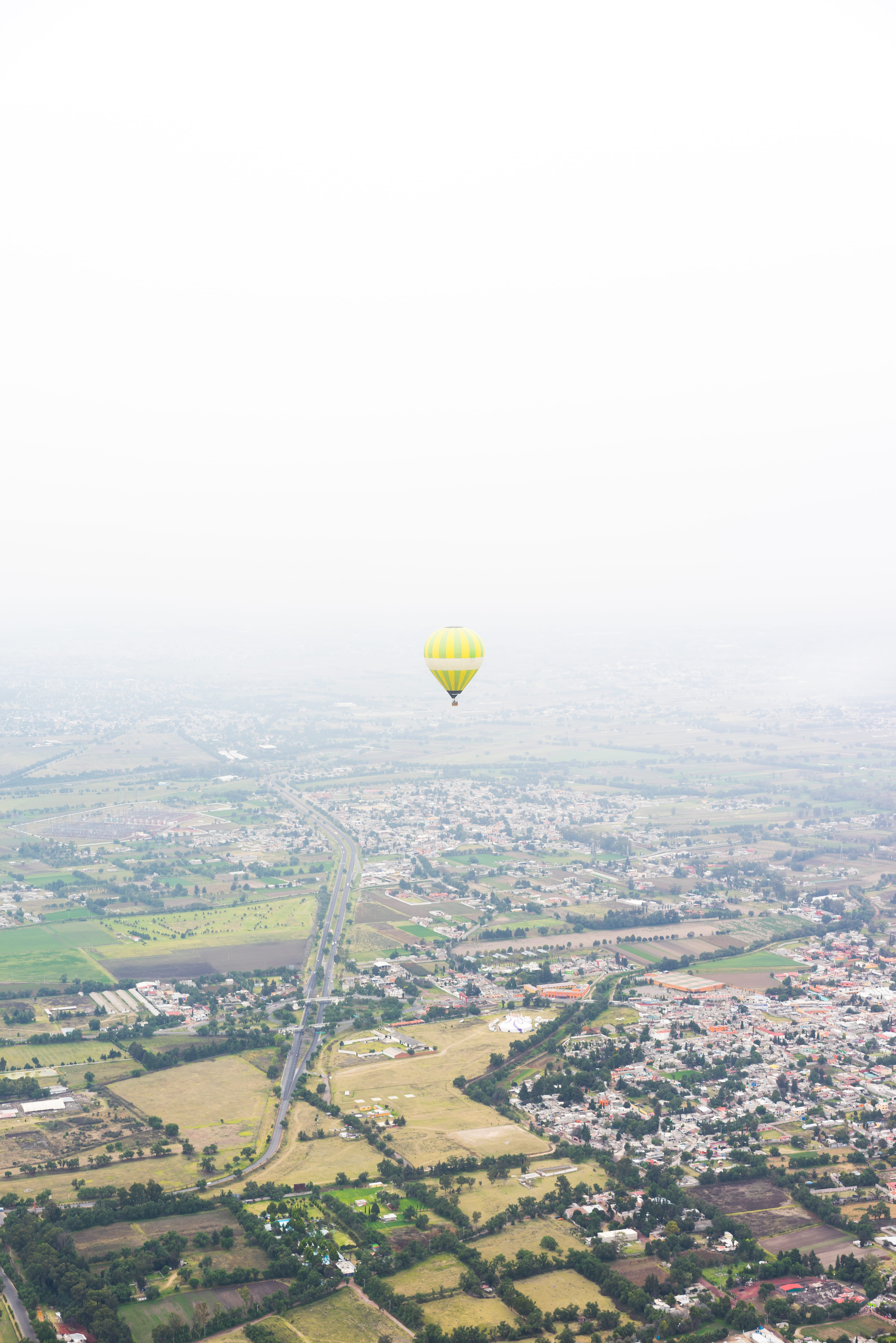 travel, hot, fly, aerial view, flight, photo, houses, copy space, nature, day, balloon, aerial, mode of transportation, town, sky, environment, no people, Phone HD Wallpaper