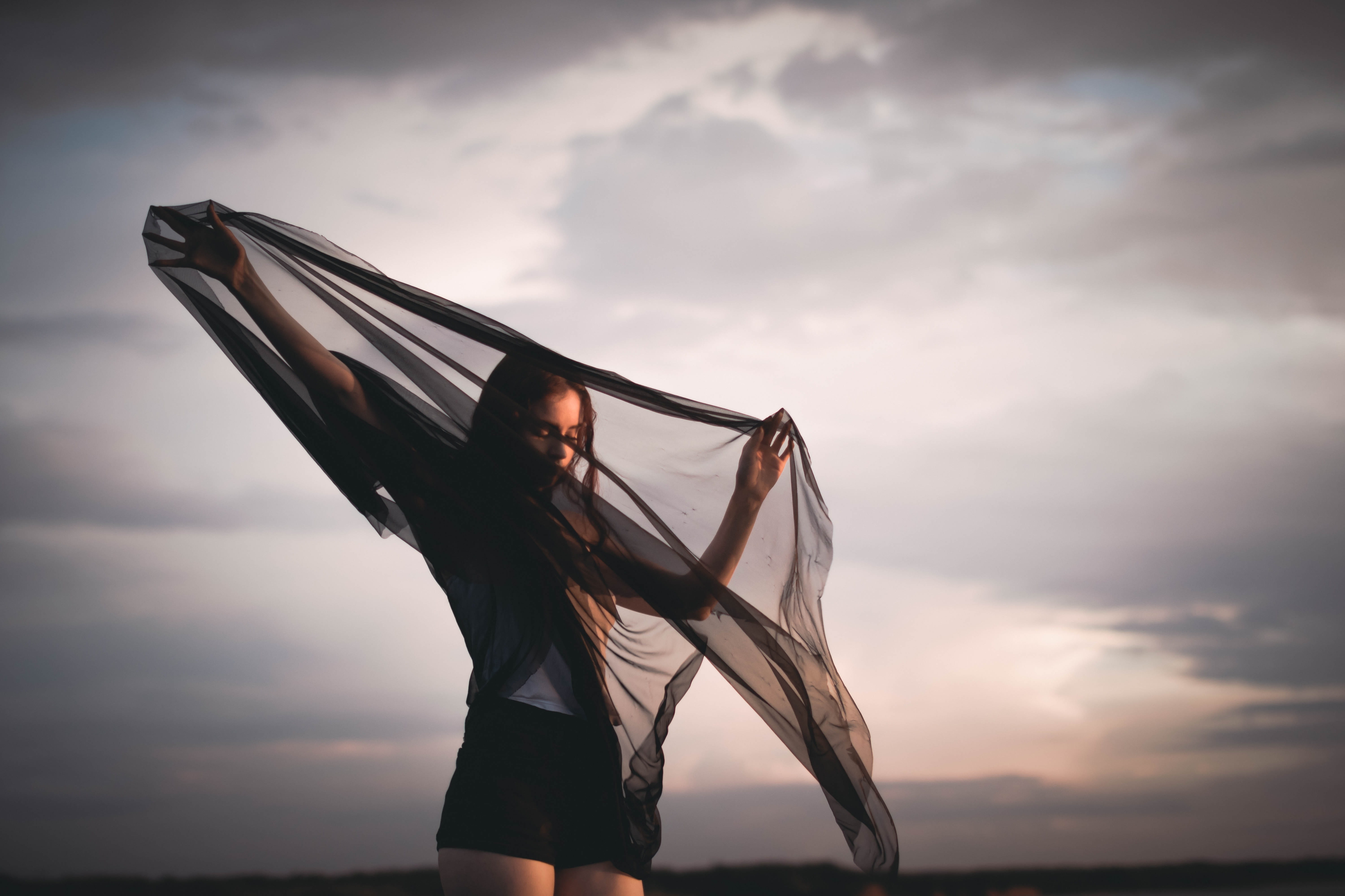 lifestyles, beautiful woman, wind, long hair, summer, females, women, silk, sky, beauty, sea, caucasian, sunset, outdoors, Lie, black, garment, nature, HD Wallpaper
