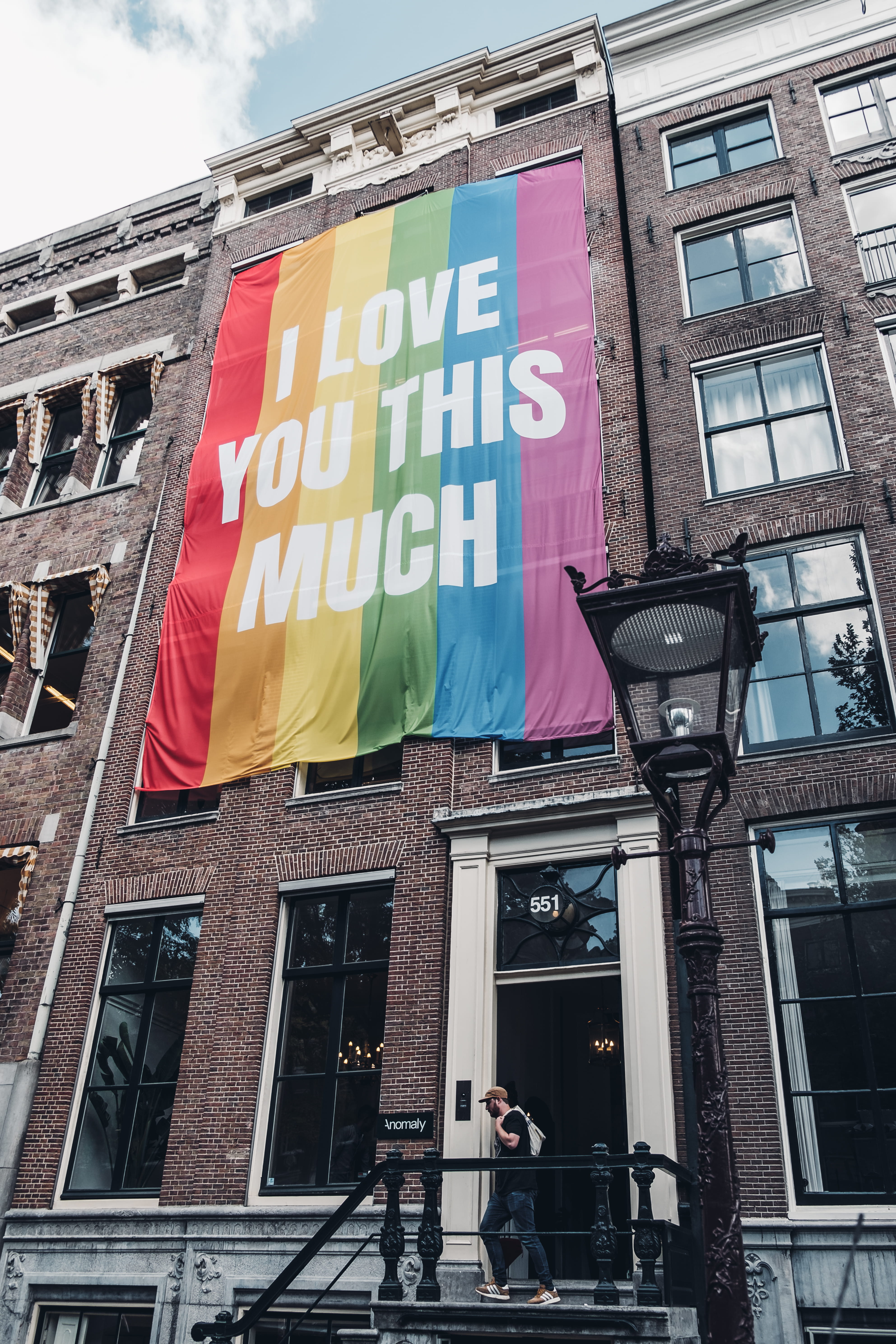 message, reflection, outdoors, poster, banner, amsterdam, real people, painted, street, urban, built structure, rainbow, communication, sky, 5K, nature, Phone HD Wallpaper