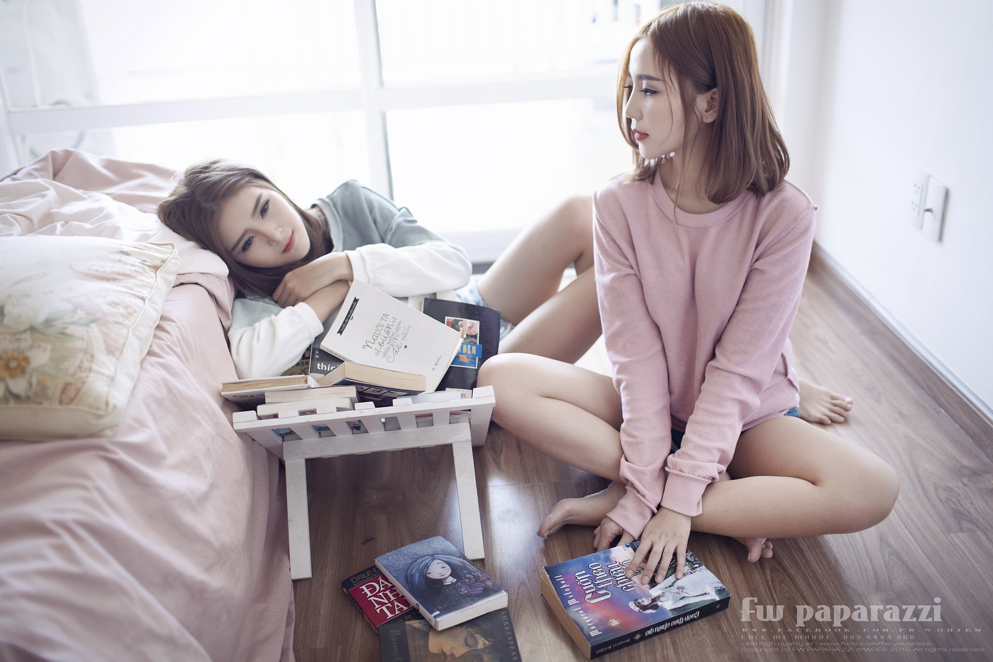 sitting, two women, FW Paparazzi, women, on the floor, bed, 1080P, long hair, watermarked, brunette, Asian, legs, model, wooden floor, legs crossed, books, HD Wallpaper