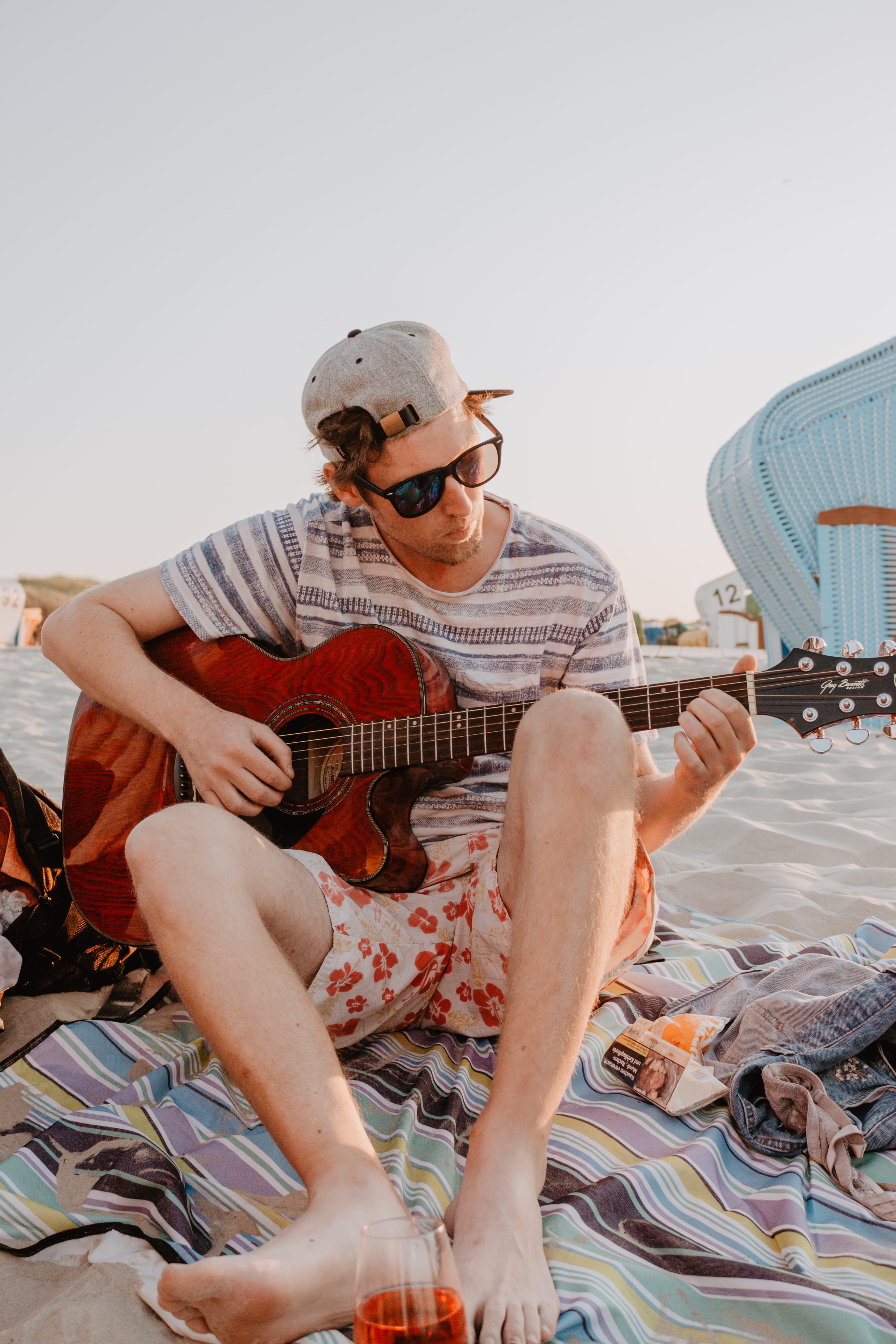 wearing, leisure Activity, music, gray, people, happiness, outdoors, shirt, fun, sunset, strum, smiling, musical Instrument, lifestyles, caucasian Ethnicity, Phone HD Wallpaper