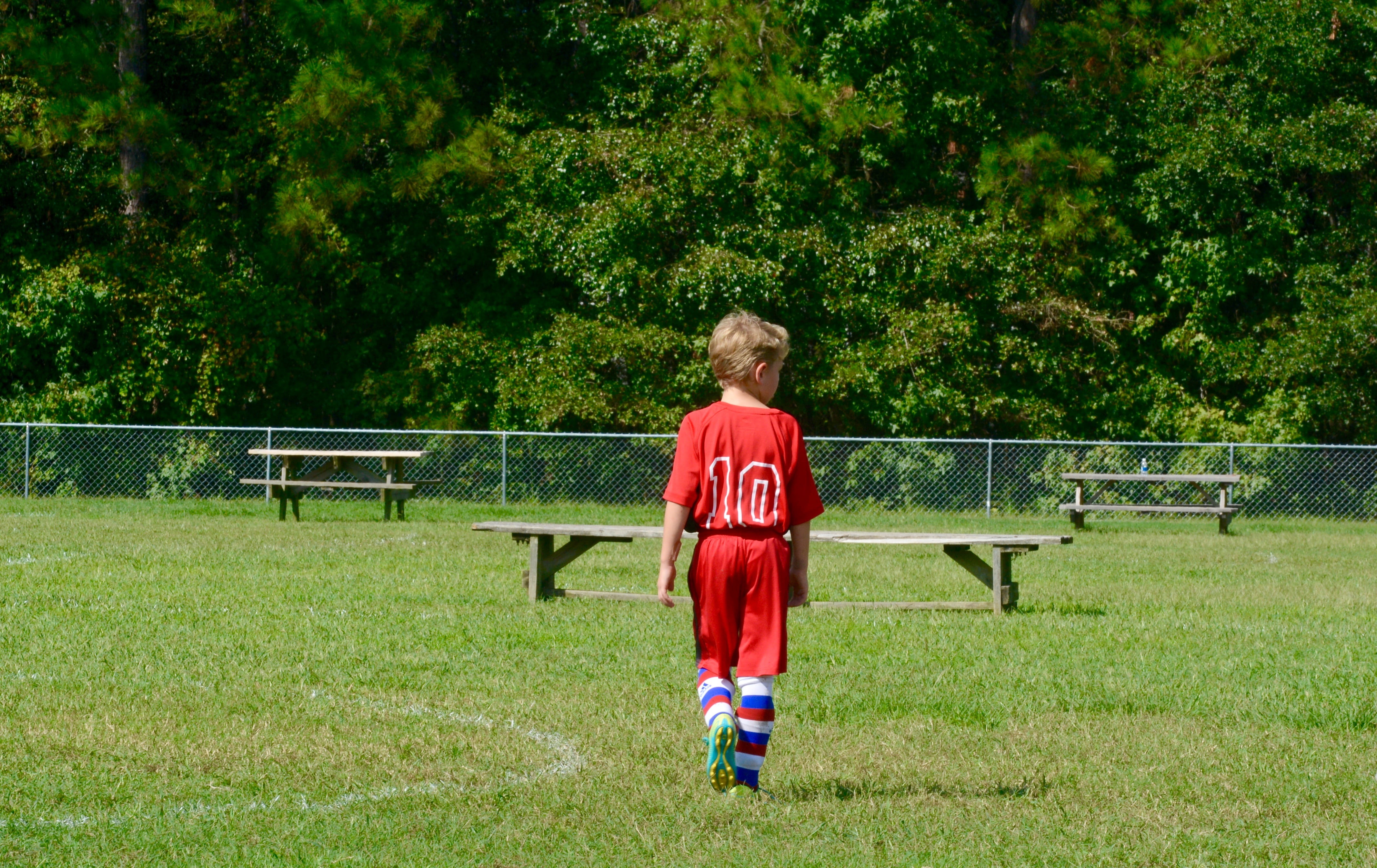 grass, lifestyles, seat, grandson, 4K, outdoors, full length, hairstyle, one person, tree, leisure activity, green color, plant, growth, land, day, soccer, HD Wallpaper