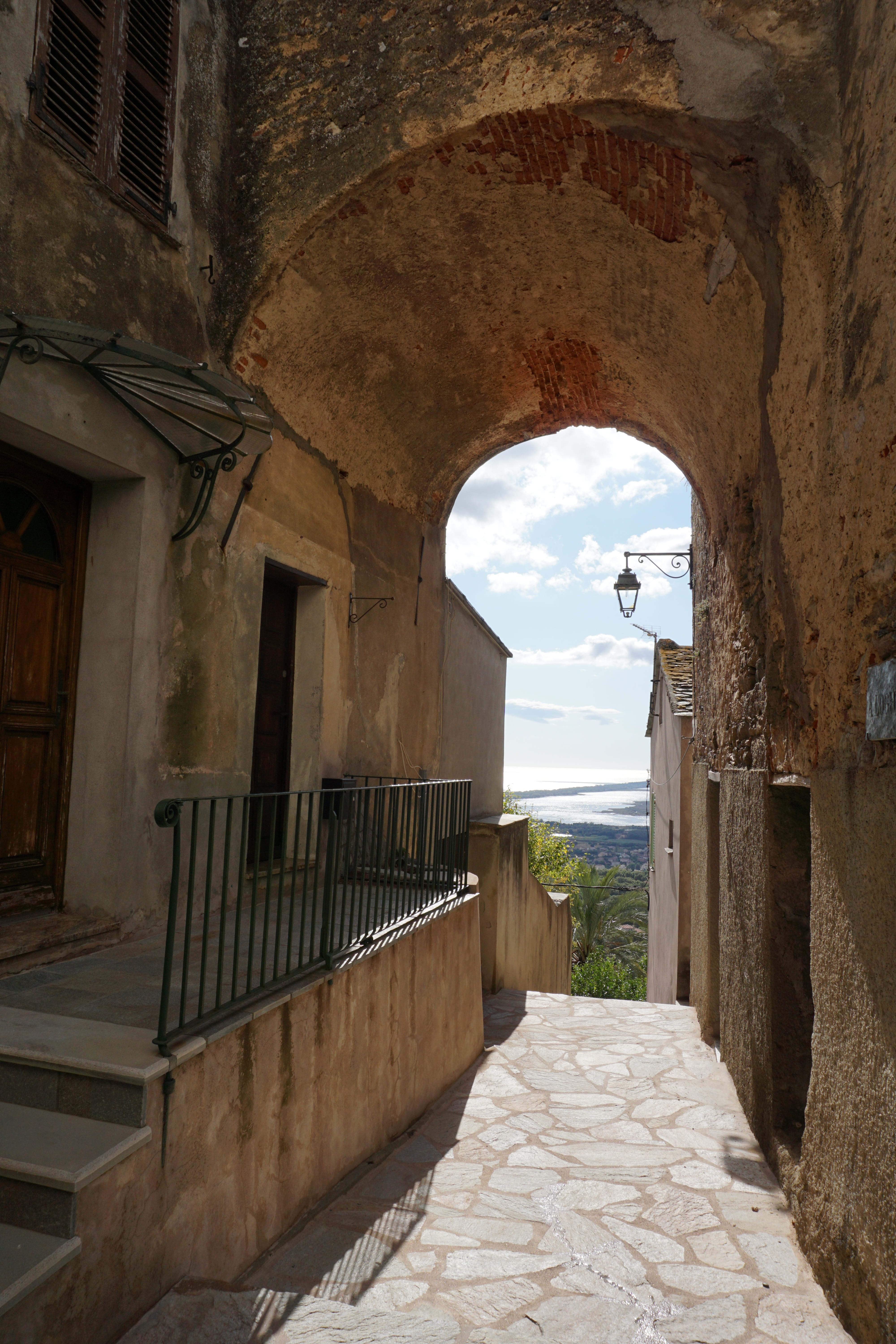 perspective, no people, outdoors, day, the way forward, building, sky, direction, bastia, empty, arched, history, sunlight, the past, views of the lido de la marana, Phone HD Wallpaper