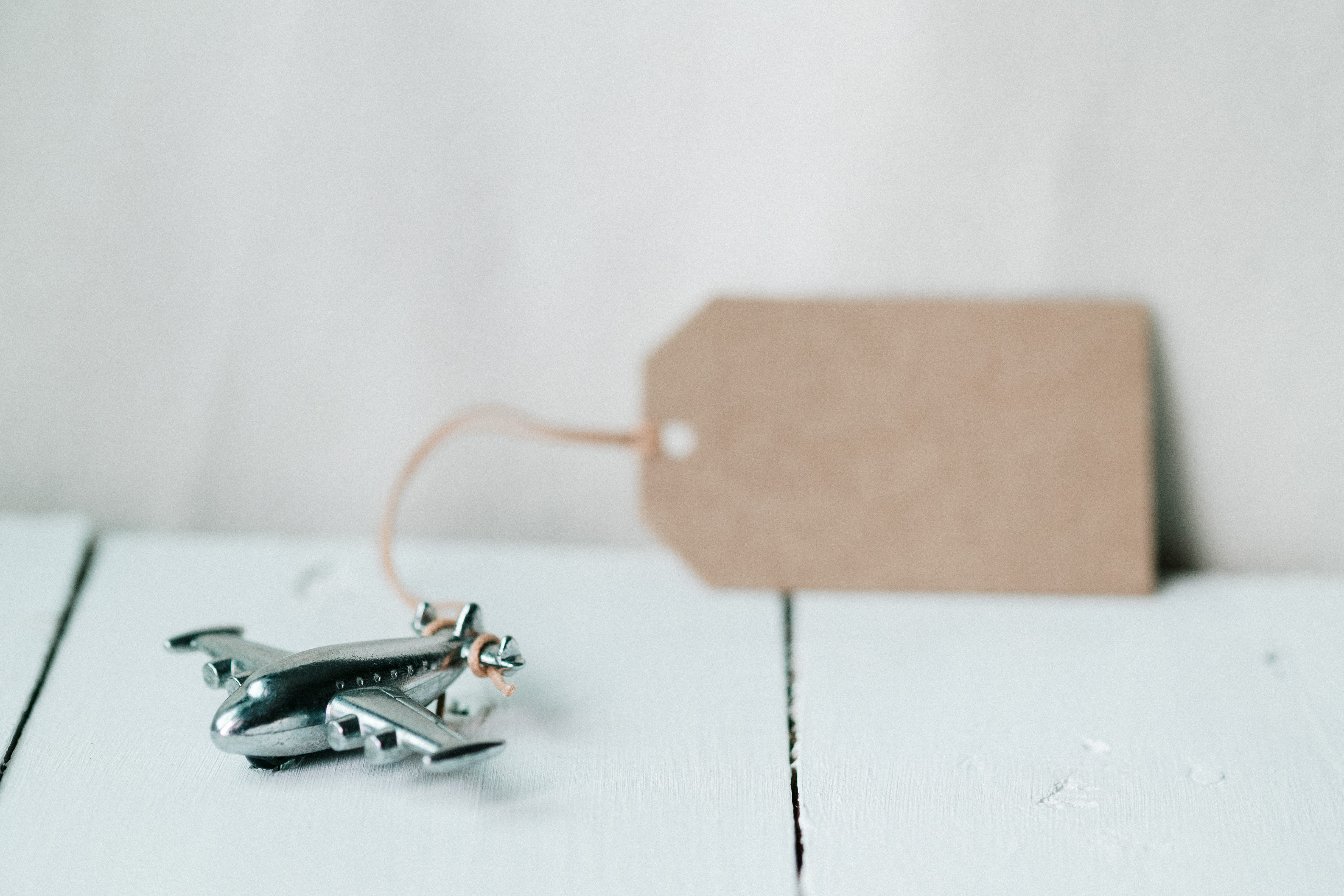 desk, plane, aircraft, bookmark, wood - material, table, indoors, blur, connection, toy, single object, airplane, keychain, celebration, copy space, 4K, HD Wallpaper