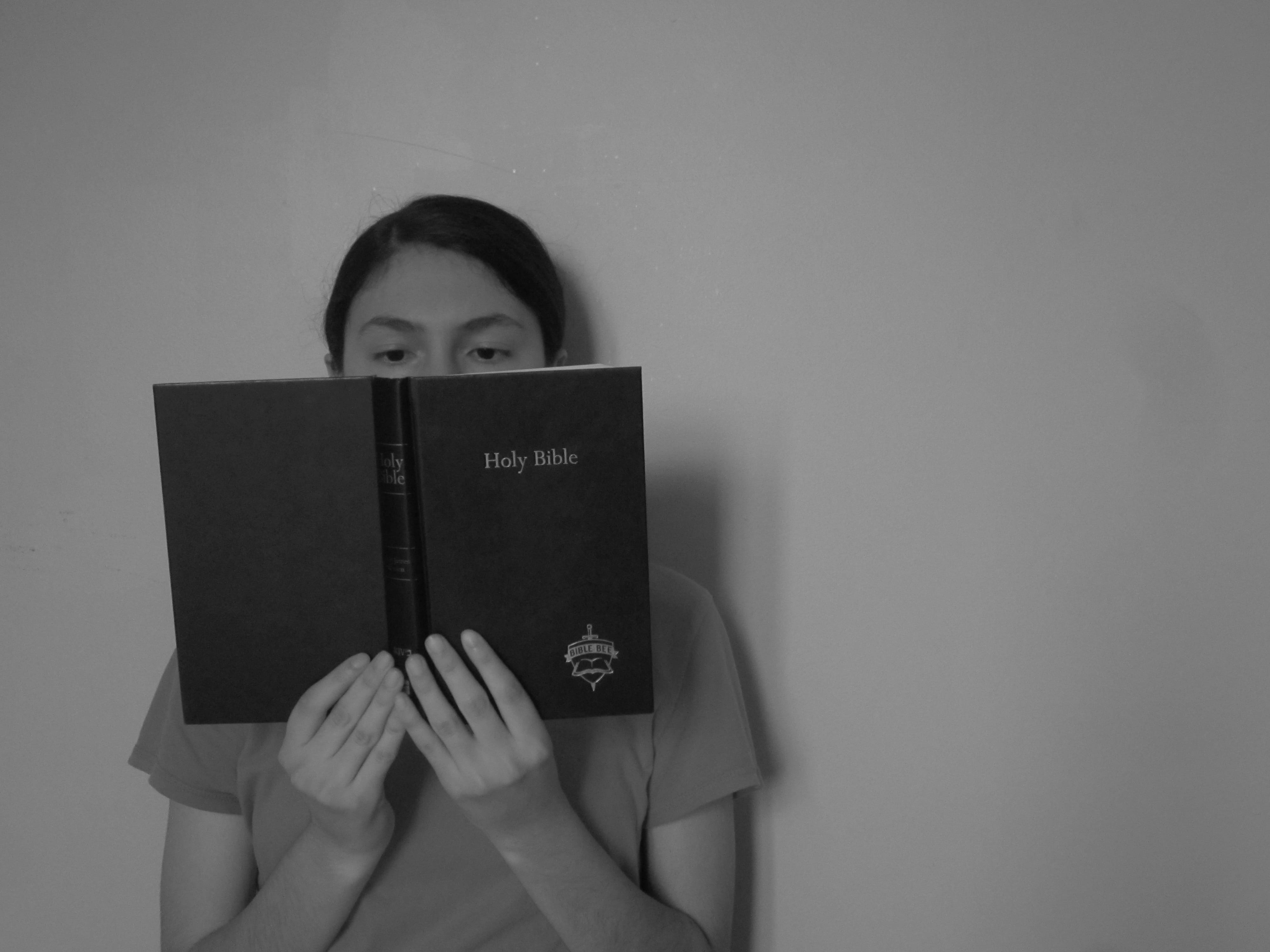 indoors, front view, looking at camera, studio shot, copy space, women, reading, childhood, publication, headshot, bible bee, text, bible, child, wall - building feature, HD Wallpaper