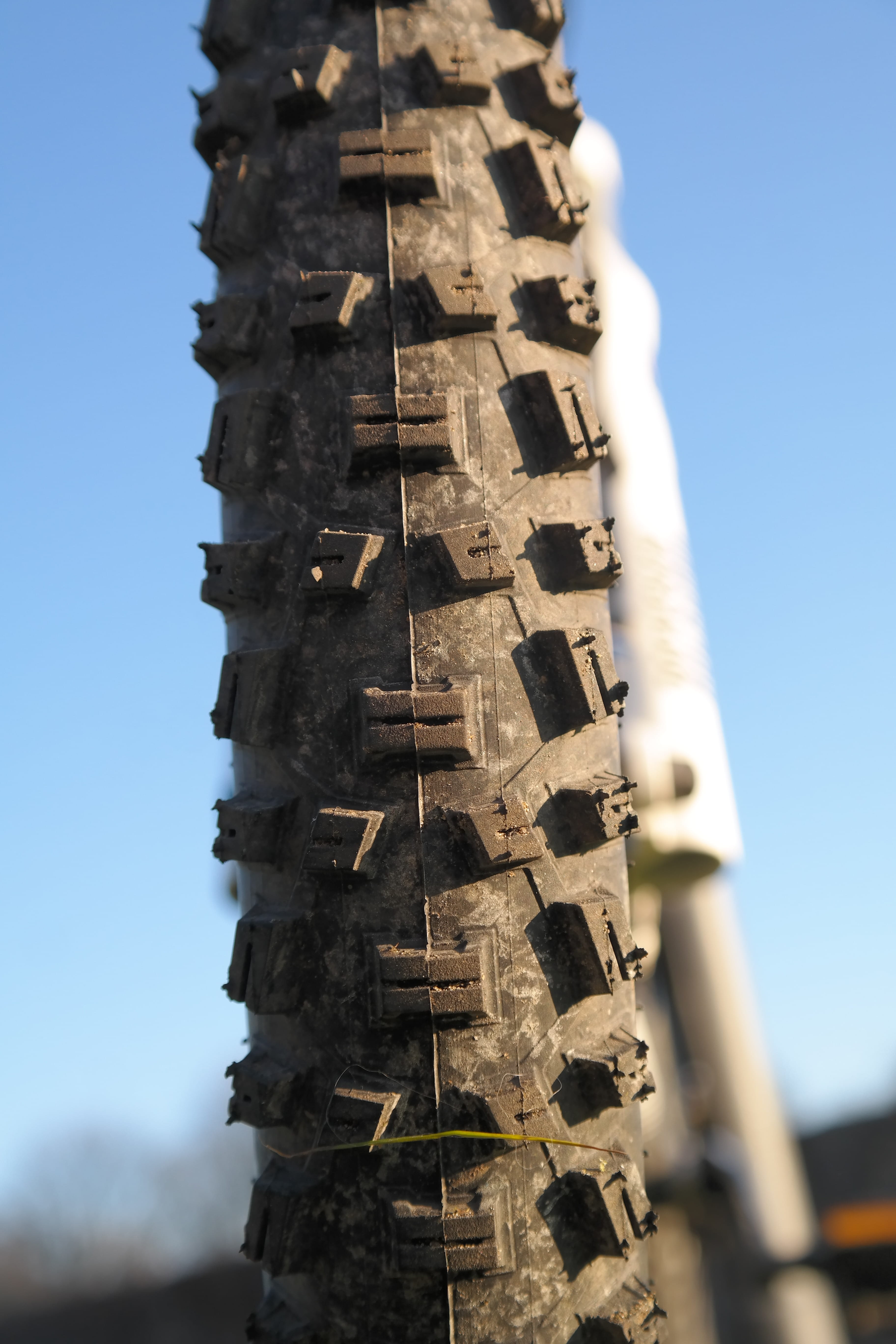 low angle view, sky, Tunnel, day, place of worship, Bicycle Tires, history, sunlight, religion, outdoors, focus on foreground, built structure, mountain bike, Phone HD Wallpaper