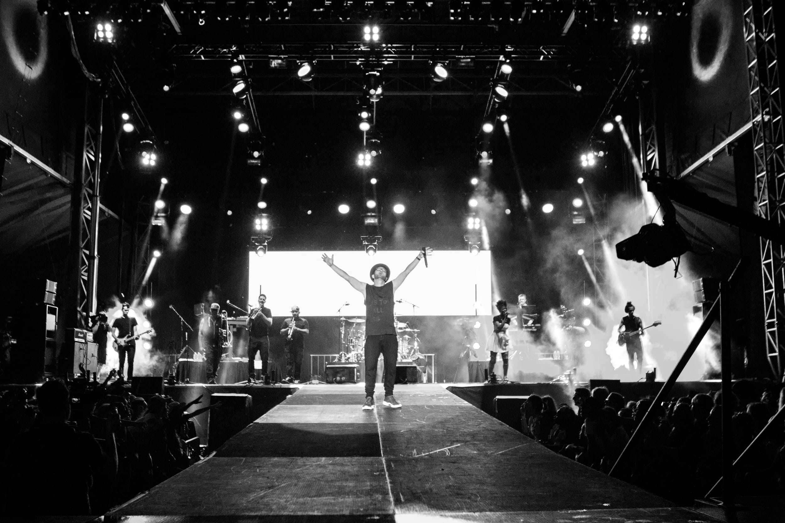 indoors, festical, praise, music, built structure, stage, one person, cool, standing, illuminated, light, leisure activity, 1080P, christain, arms raised, HD Wallpaper