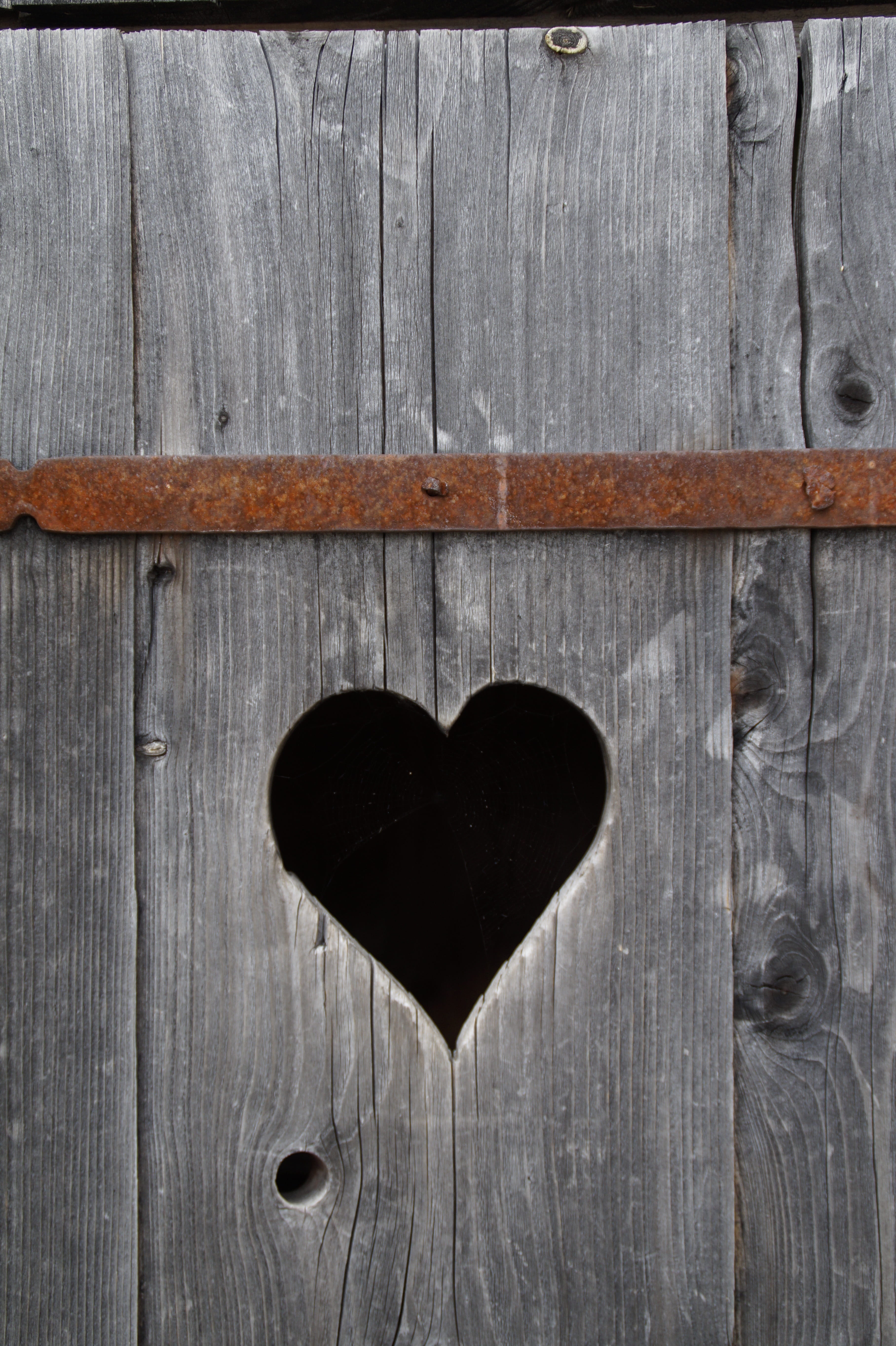 day, full frame, rustic, grain, emotion, valentines Day - Holiday, textured, brown, old, heart in the wood, 5K, door, Cottage, wood - Material, close-up, Phone HD Wallpaper