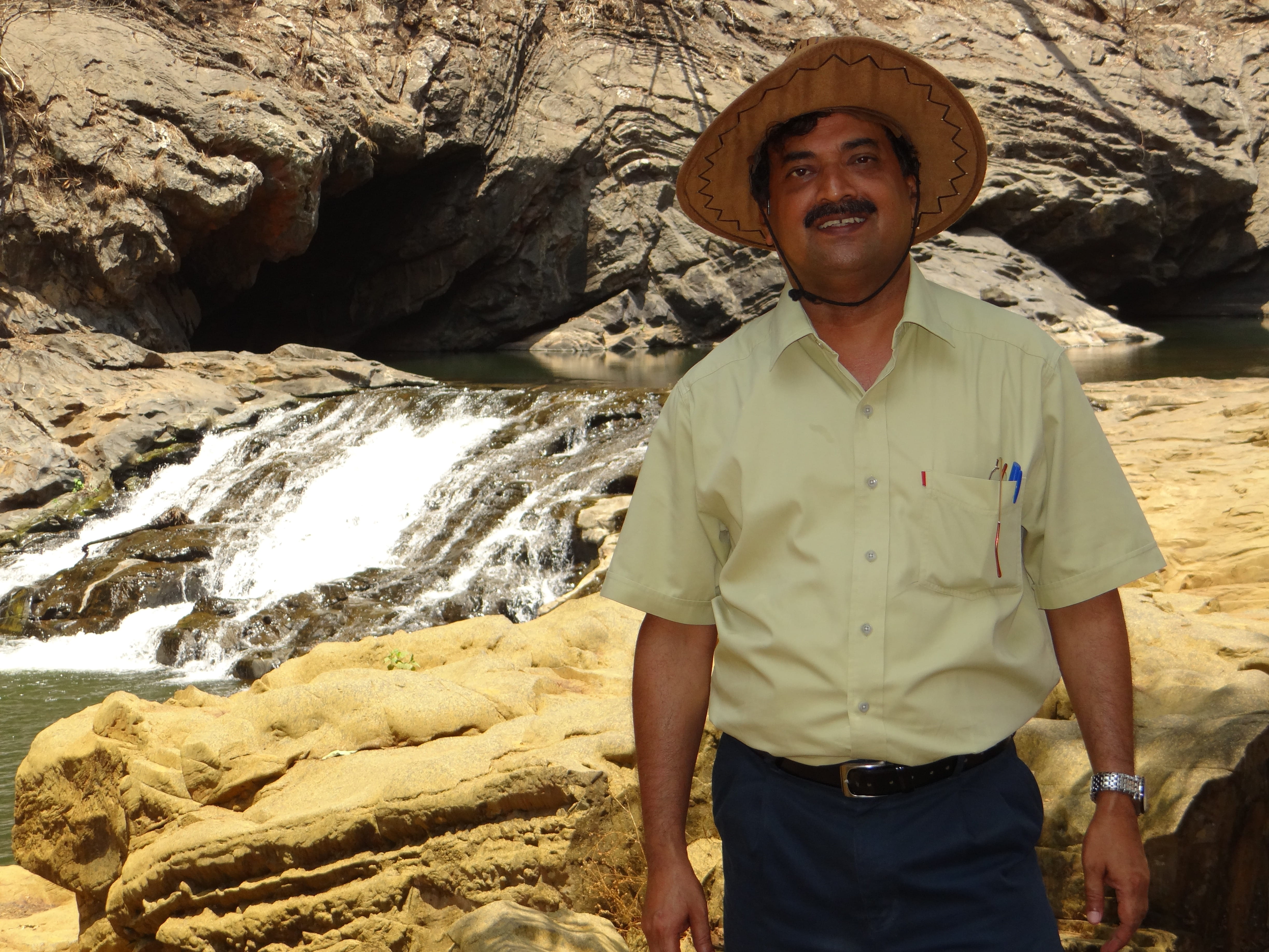 rock, Indian, young adult, portrait, karnataka, syntheri rocks, smiling, Hat, leisure activity, outdoors, standing, adults only, looking at camera, day, HD Wallpaper