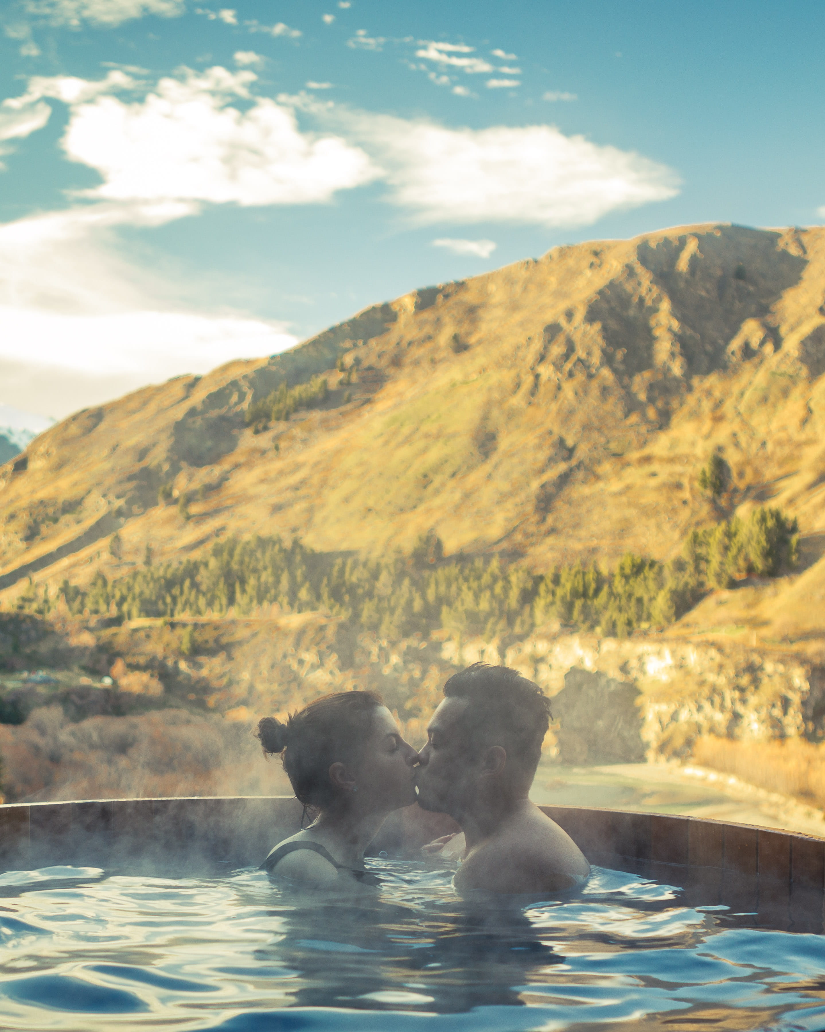 smoke, woman, scenics - nature, idyllic, two animals, love, valley, clouds, relaxation, pool, mountain, outdoors, recreation, daylight, vertebrate, kiss, Phone HD Wallpaper