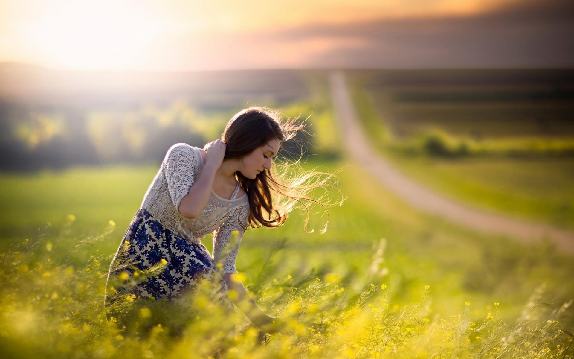women road brunette flowers windy jake olson yellow flowers sunlight nebraska depth of field long hair, 1080P, HD Wallpaper