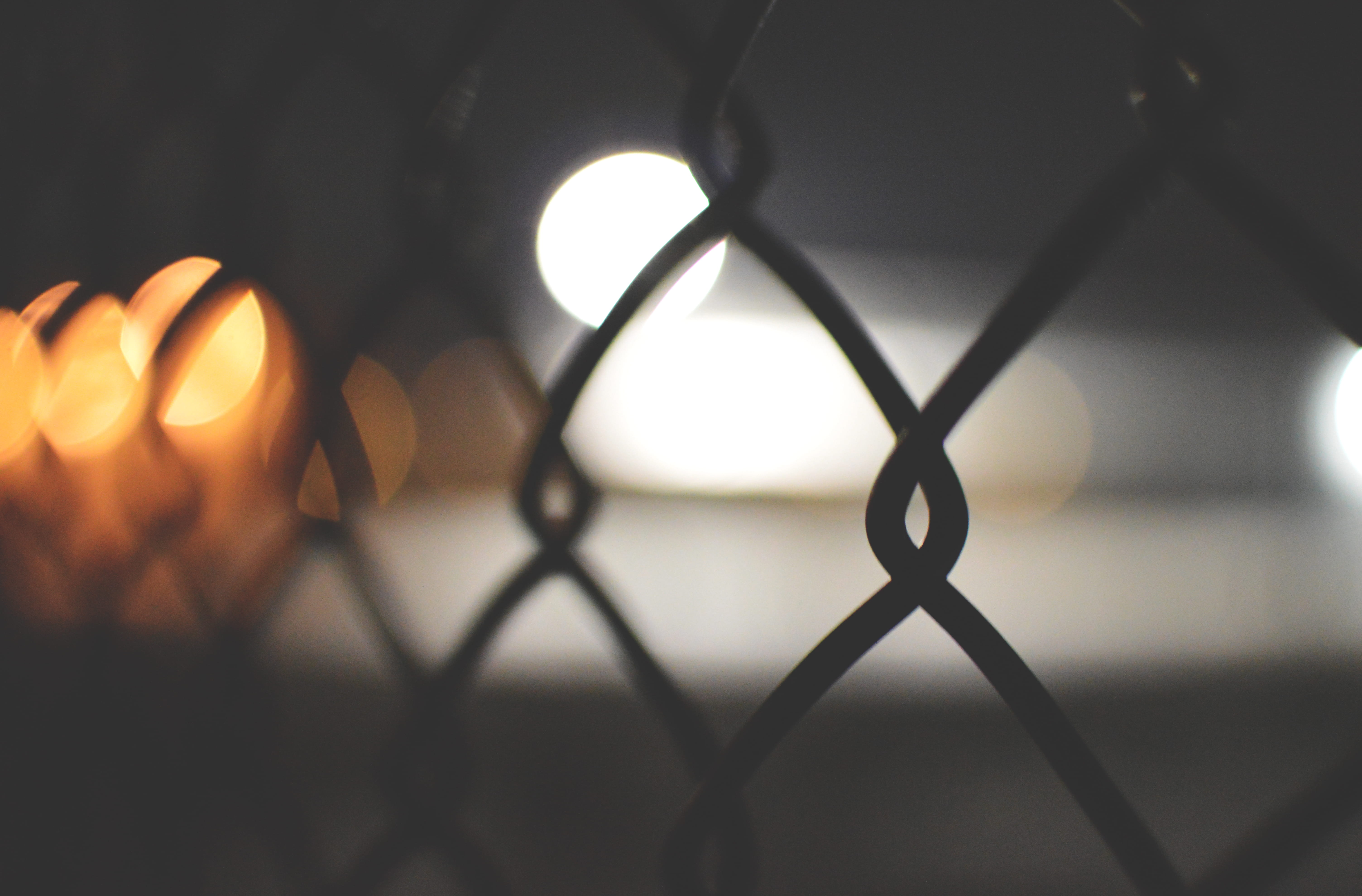 metal, focus on foreground, bokeh, black, barrier, safety, electric lamp, close-up, security, illuminated, cyclone, pattern, fence, 5K, no people, glowing, HD Wallpaper