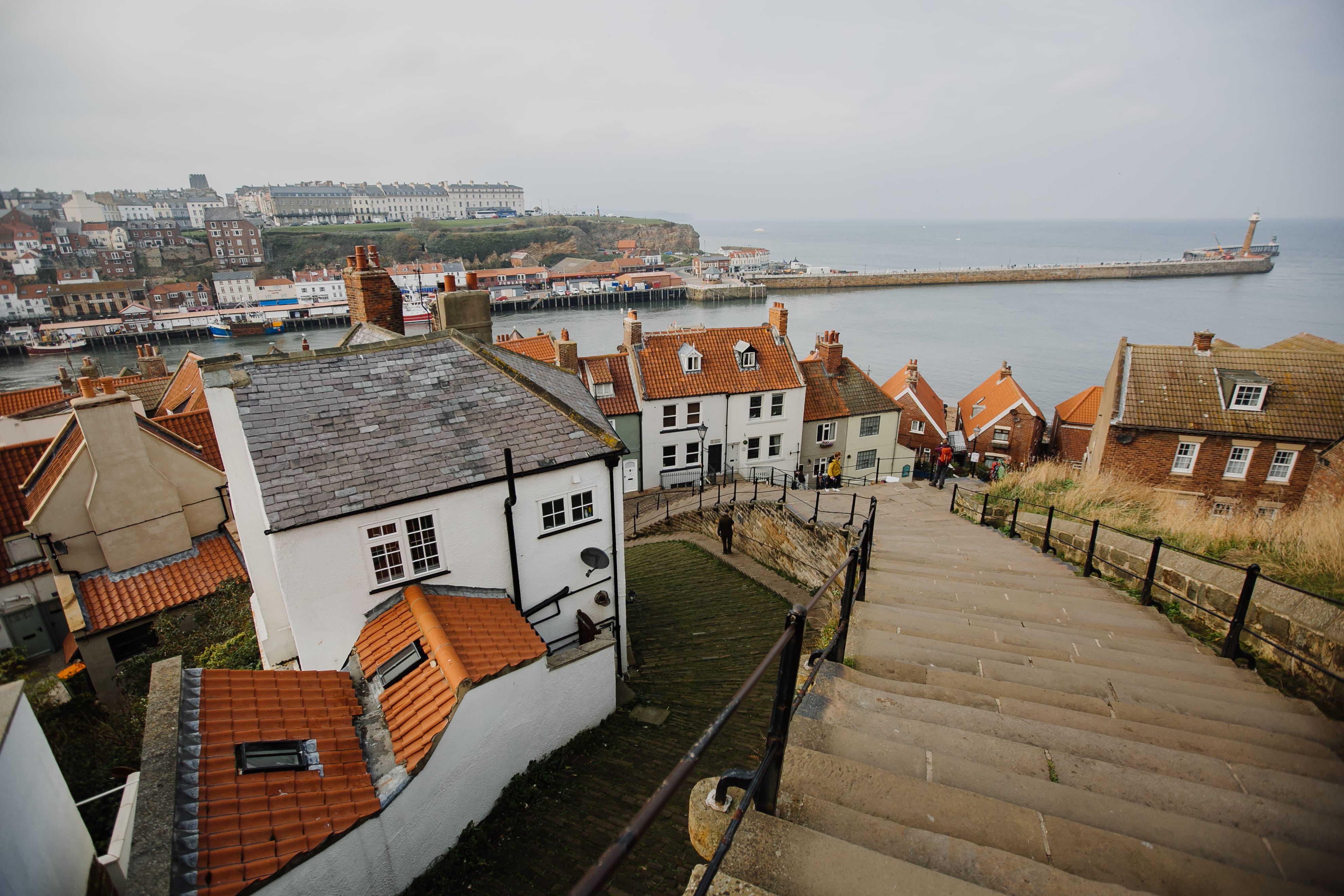 sky, daytime, human, roof tile, near, coast, house, architecture, person, 199 steps, nature, whitby, roof, transportation, outdoors, building exterior, HD Wallpaper