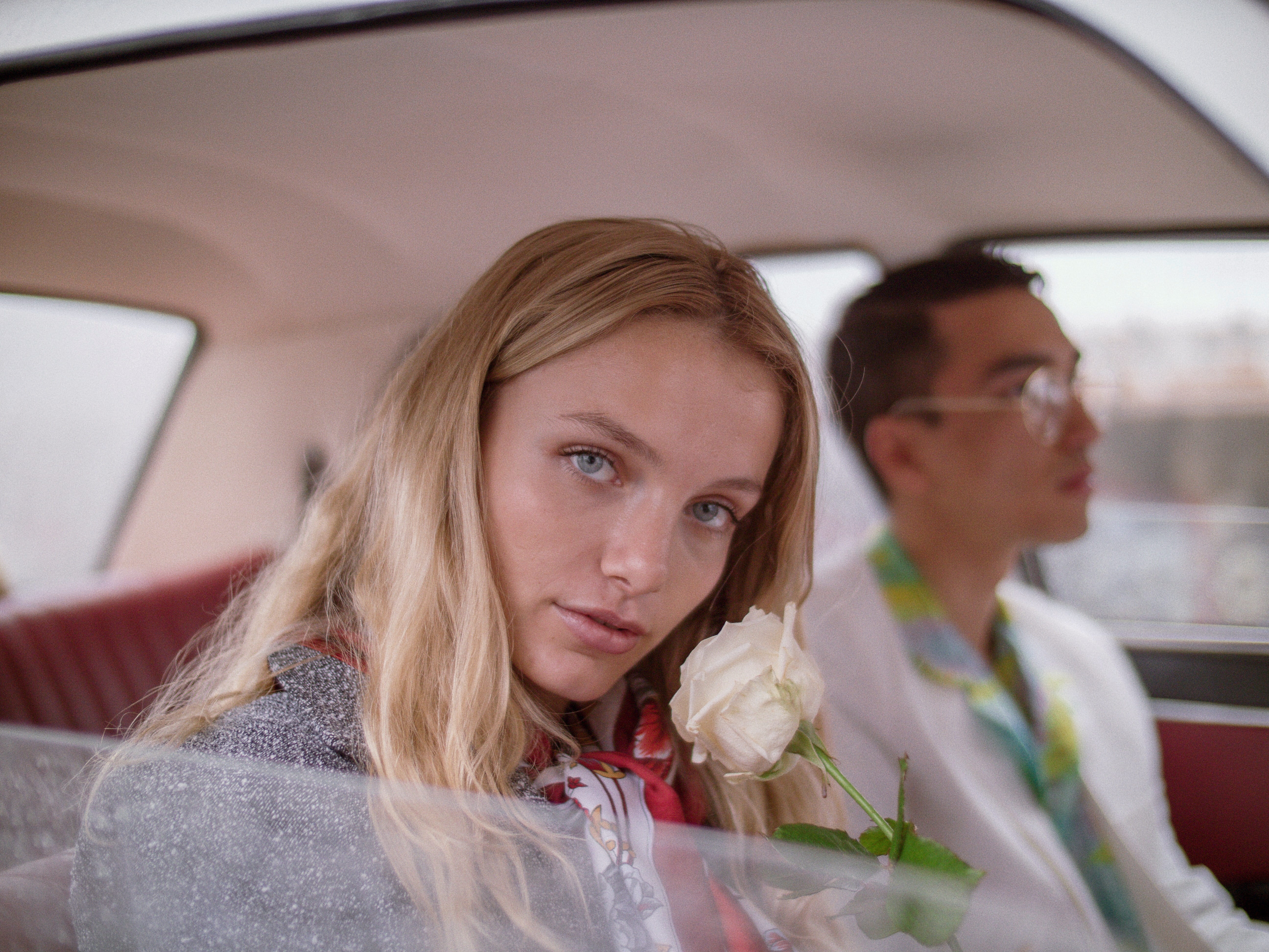 5K, car interior, contemplation, car, transportation, sitting, child, portrait, headshot, coat, teenager, adult, daytime, rose, white, motor vehicle, woman, HD Wallpaper
