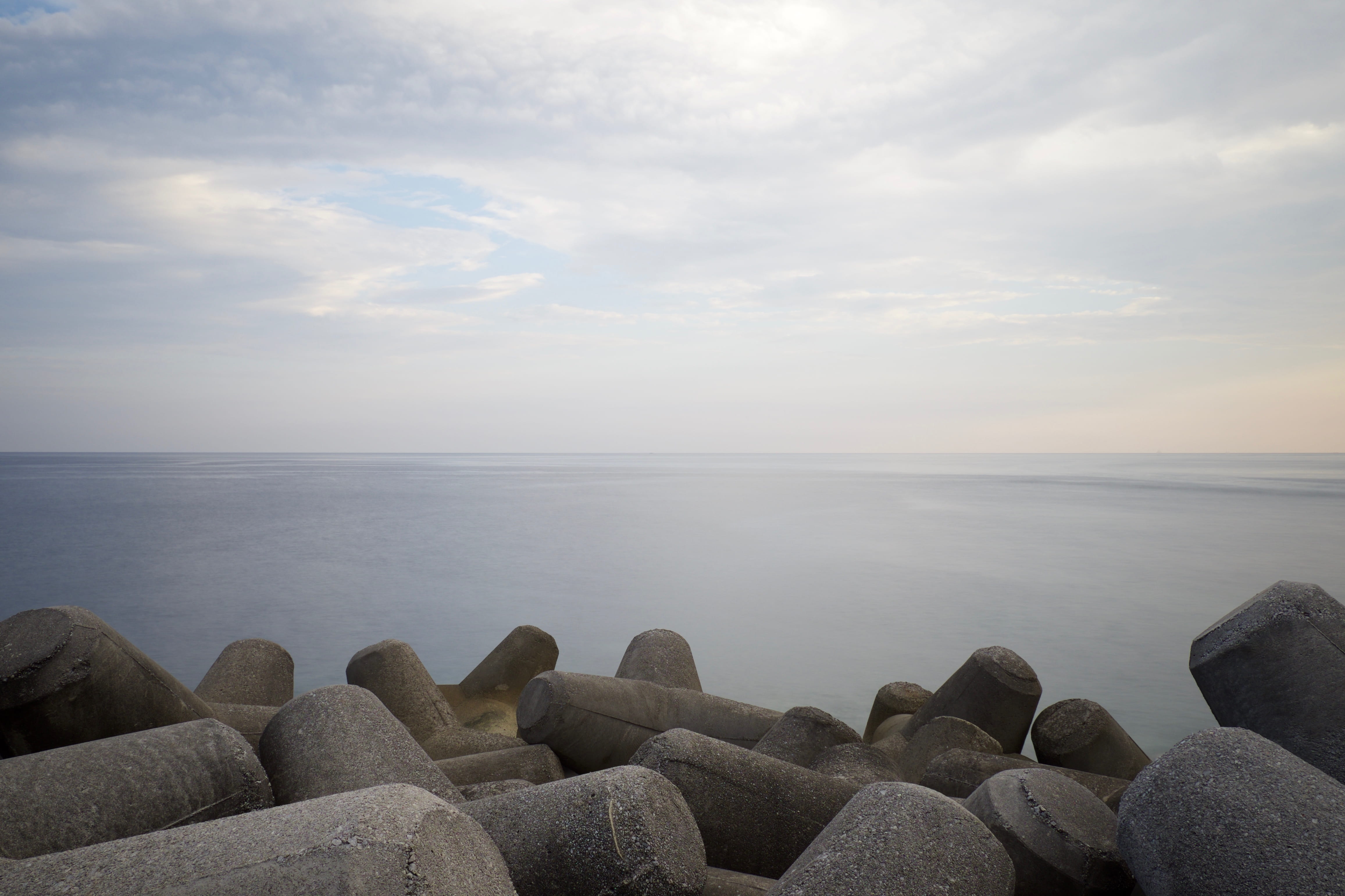 fujifilm, coast, long exposure, horizon over water, tranquility, concrete, seascape, land, rocks, tyrrhenian, sea, 4K, solid, bollards, groyne, mediterranean, HD Wallpaper