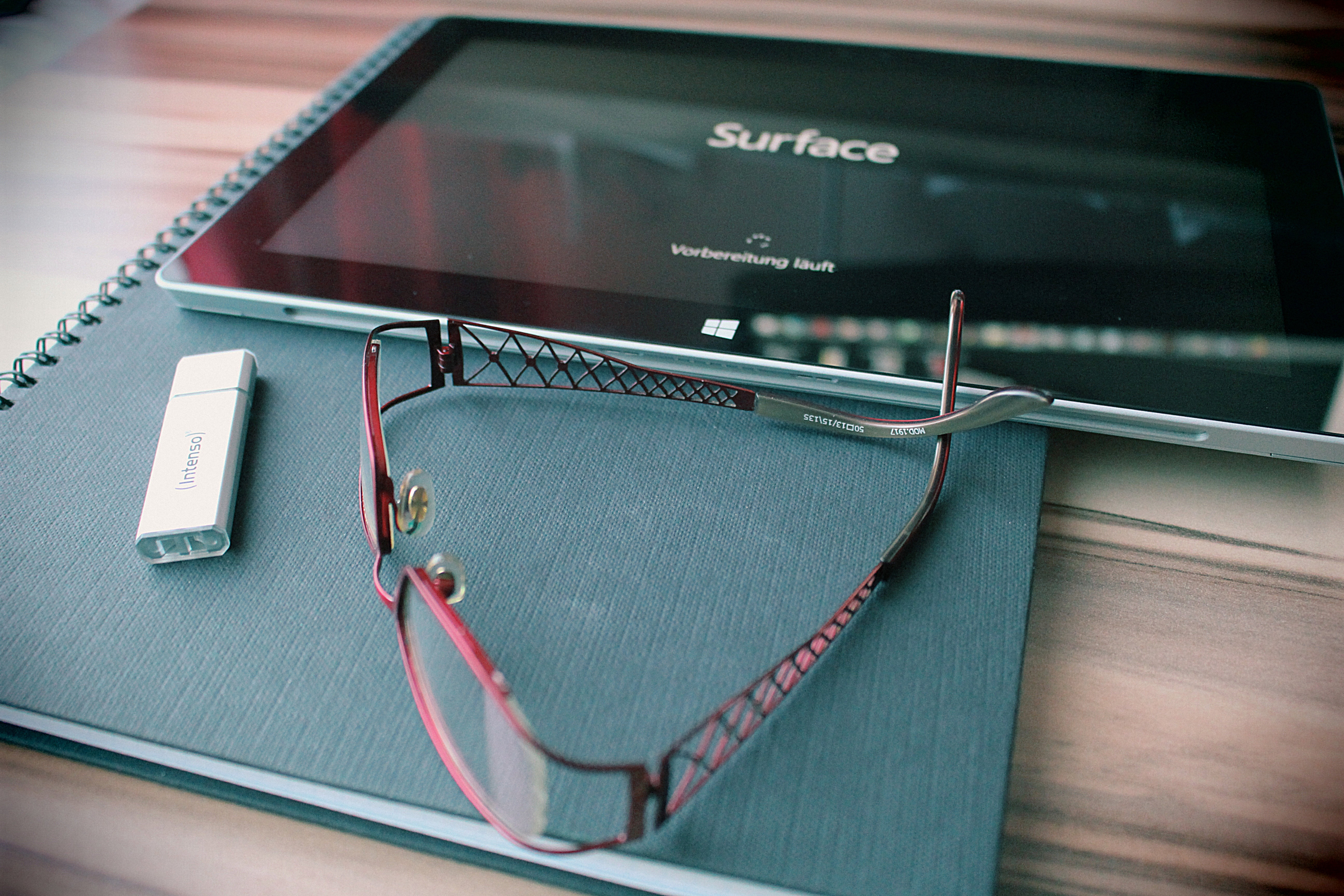reading glasses, technology, table, workplace, wireless technology, surface, high angle view, text, glasses, personal accessory, usb stick, microsoft, top, HD Wallpaper