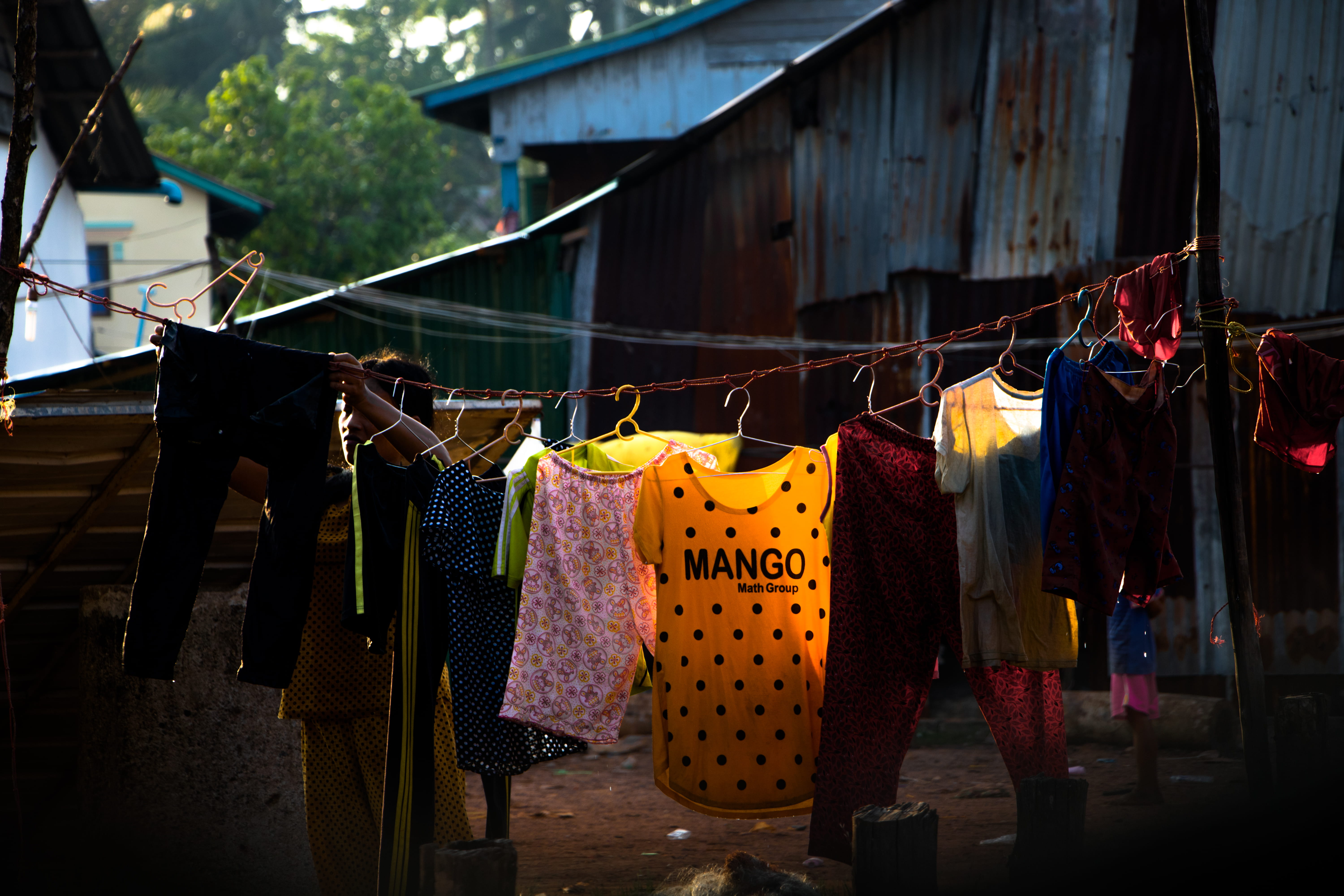 hanging, focus on foreground, drying rack, house, residential district, drying, person, back, undershirt, bazaar, laundry, apparel, human, choice, building, HD Wallpaper