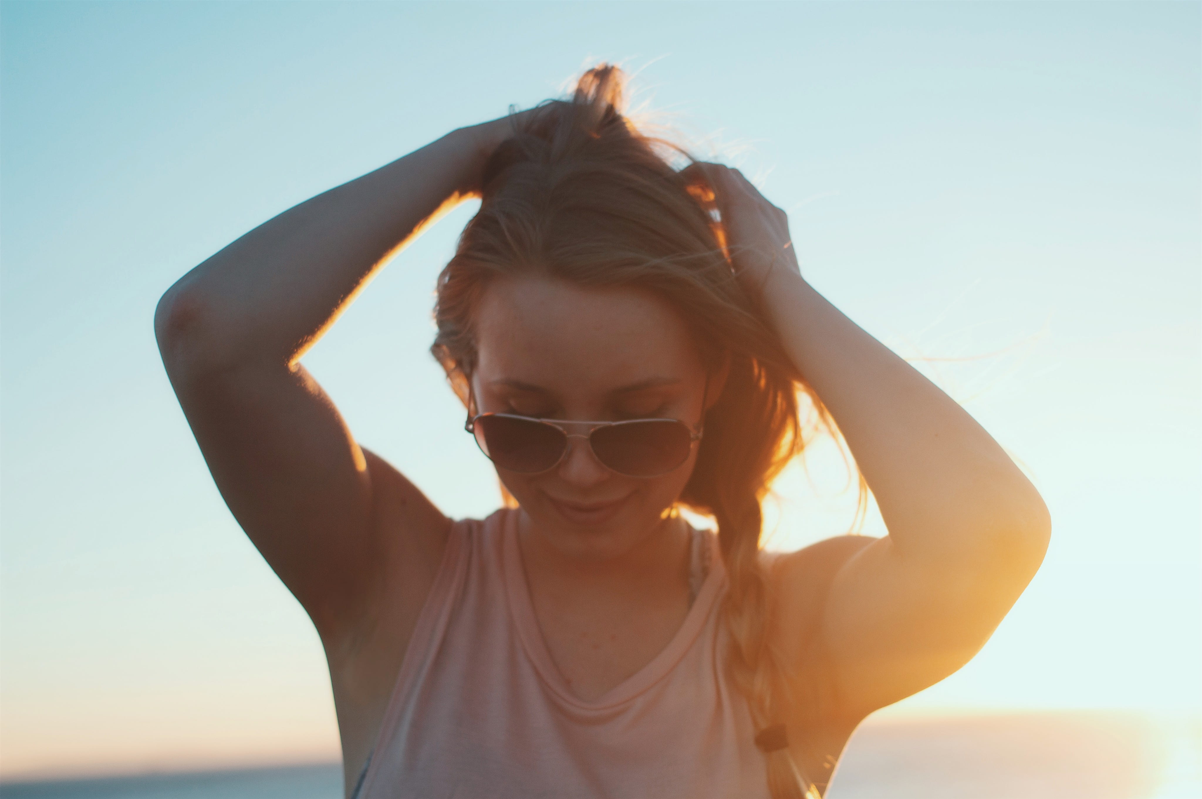 sky, hairstyle, holding, arms raised, human arm, outdoors, women, glasses, female, adult, sunset, sunglasses, beige, fashion, 4K, sunrise, young adult, HD Wallpaper