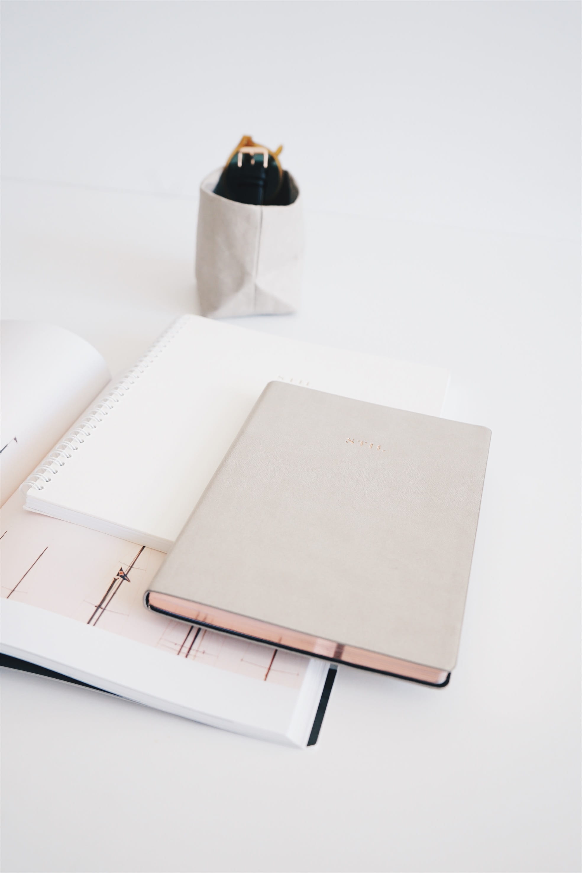 file binder, coffee table, white background, paper, notebooks, writing instrument, clothing, text, notebook, blank, three, fountain pen, pen, desk, note pad, Phone HD Wallpaper
