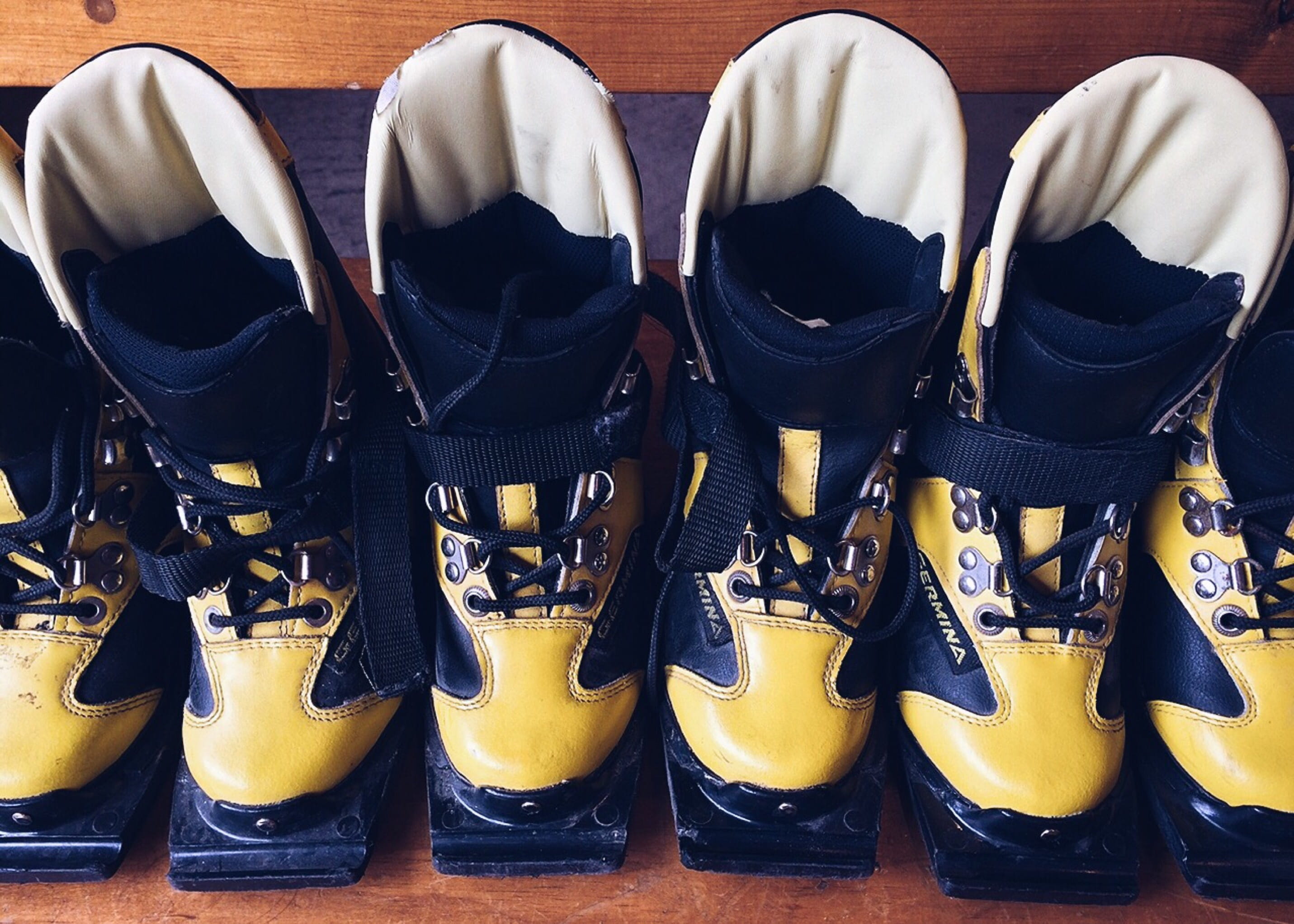 variation, side by side, indoors, order, worn, boots, ski, boot, wood, equipment, still life, 2K, high angle view, day, no people, clothing, old, leather, HD Wallpaper