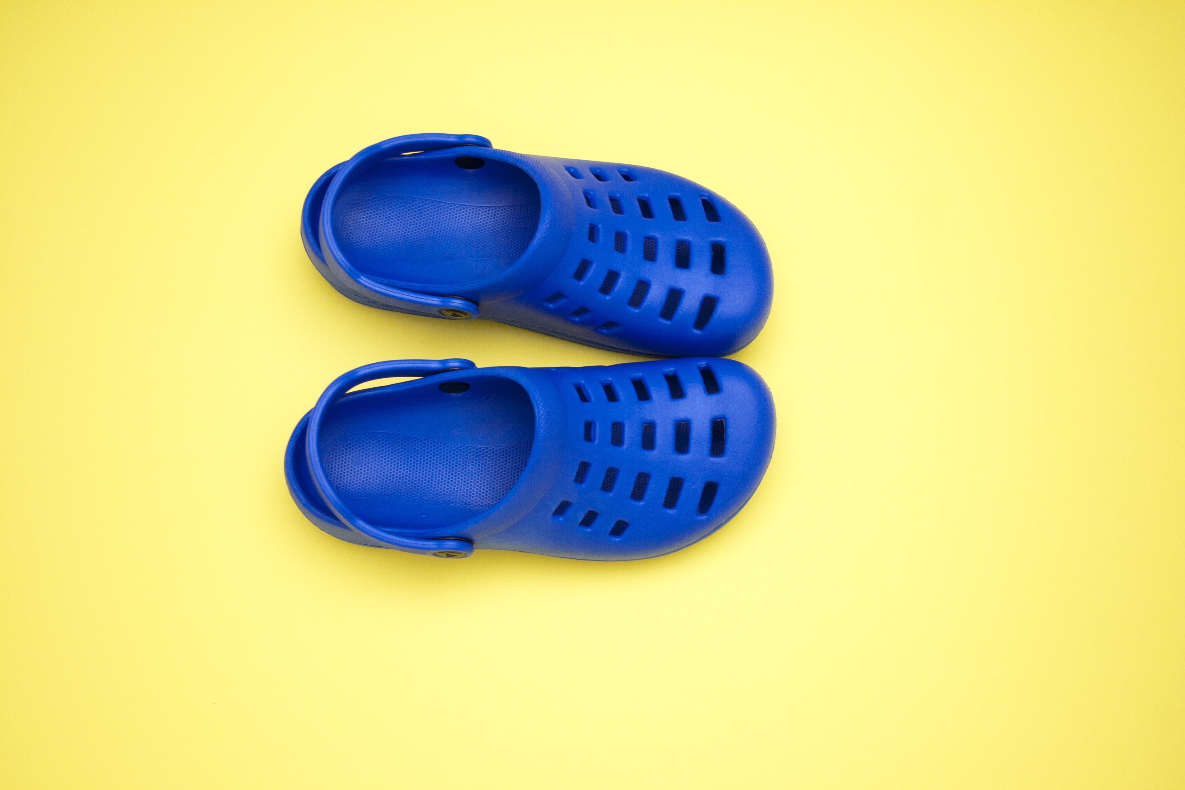 indoors, crocs, 4K, footwear, yellow, group of objects, pair, casual, colored background, studio shot, sandals, shoes, rubber, choice, cut out, fashion, HD Wallpaper