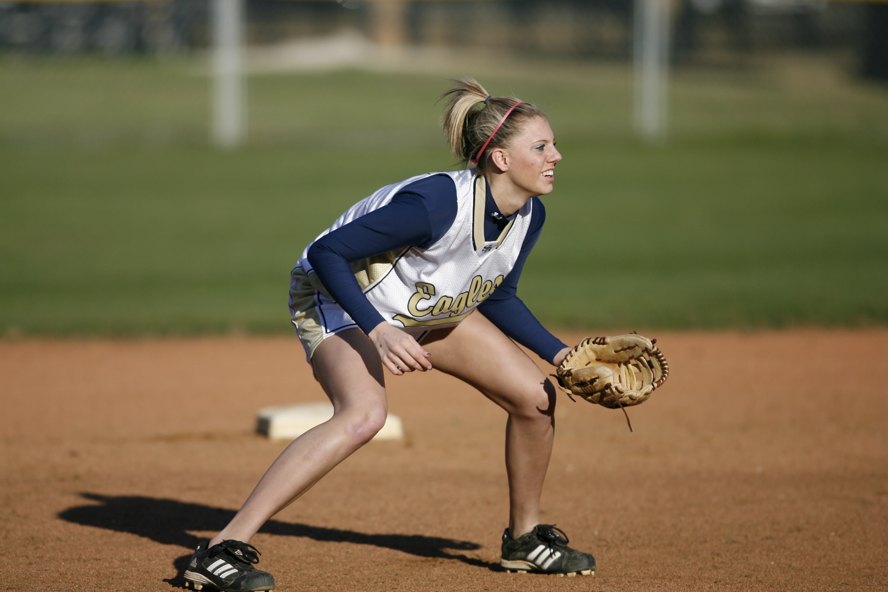 smiling, legs, play, woman, mitt, game, one person, girl, competition, baseball - sport, photography, 2K, outdoors, day, focus on foreground, happy, softball, HD Wallpaper