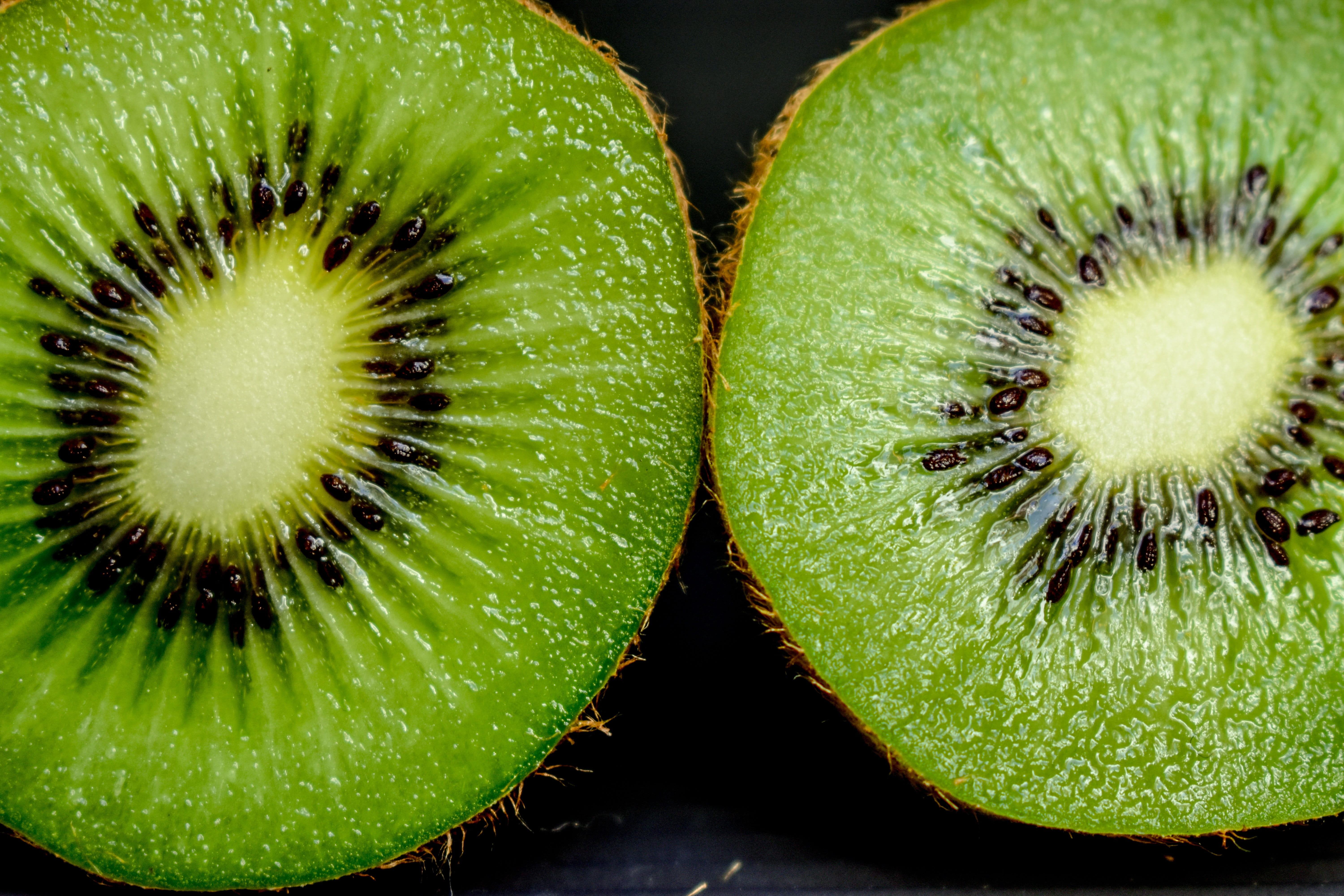 food, round, black background, cross section, kiwi, halved, indoors, no people, food and drink, close-up, 5K, ripe, vivid, slice, freshness, two objects, HD Wallpaper