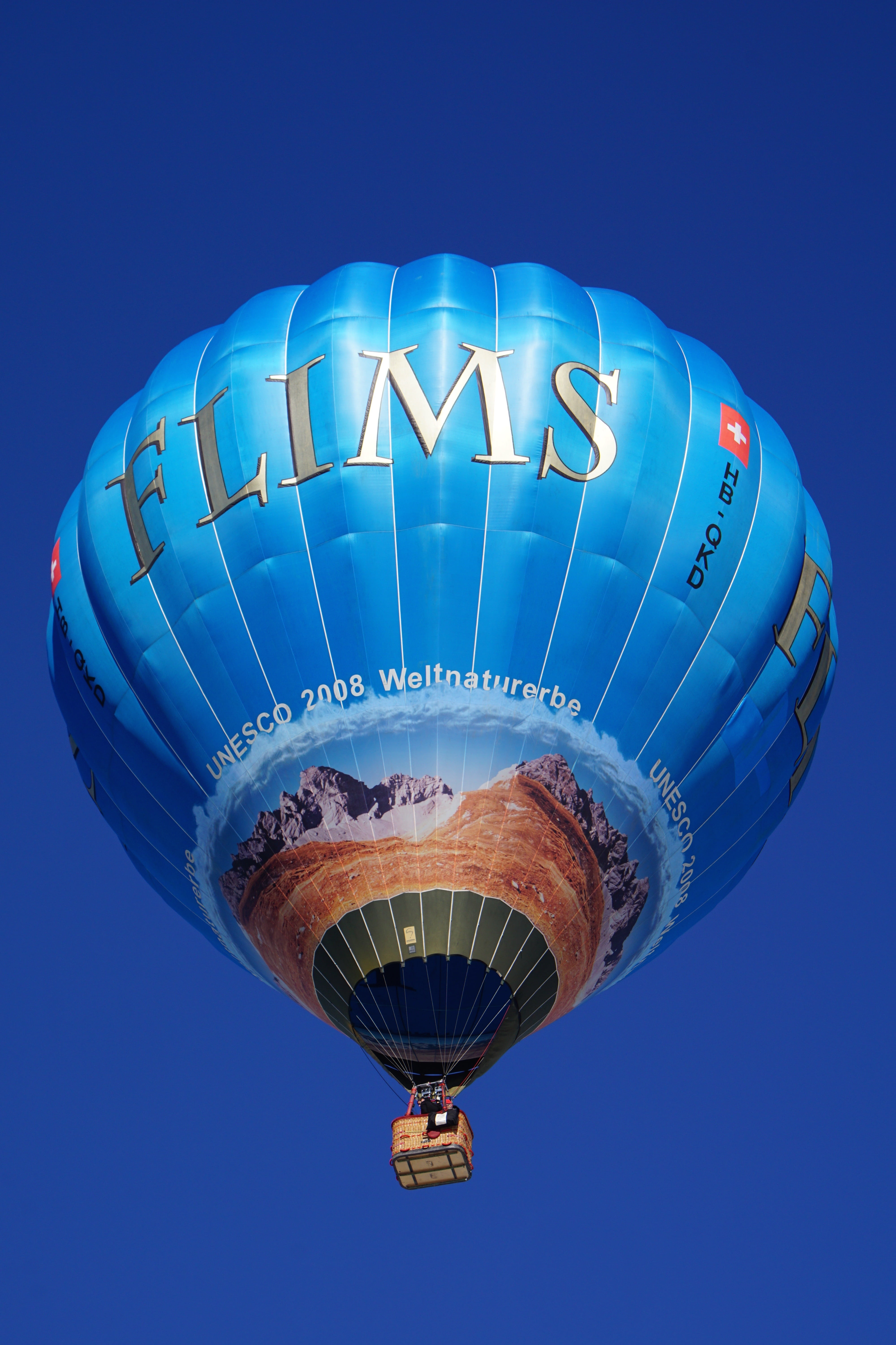 mid-air, balloon festival, alpine, blower, light spectrum, gas, float, sleeve, winter, air, basket, tourism, more, blue background, aviation, clear sky, Phone HD Wallpaper