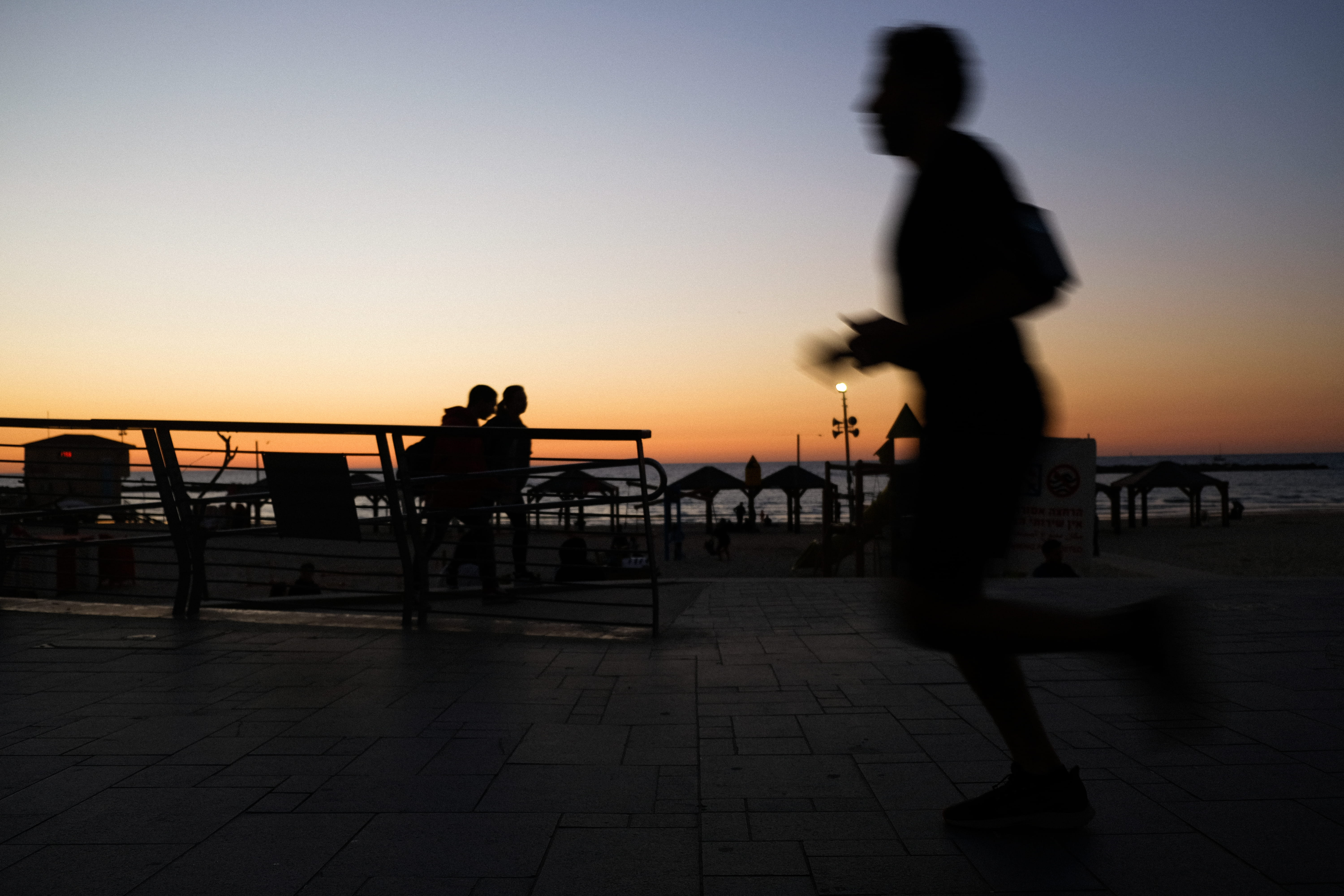 group of people, running, sunset, promenade, beauty in nature, architecture, railing, beach, photography, leisure activity, water, man, person, orange color, HD Wallpaper