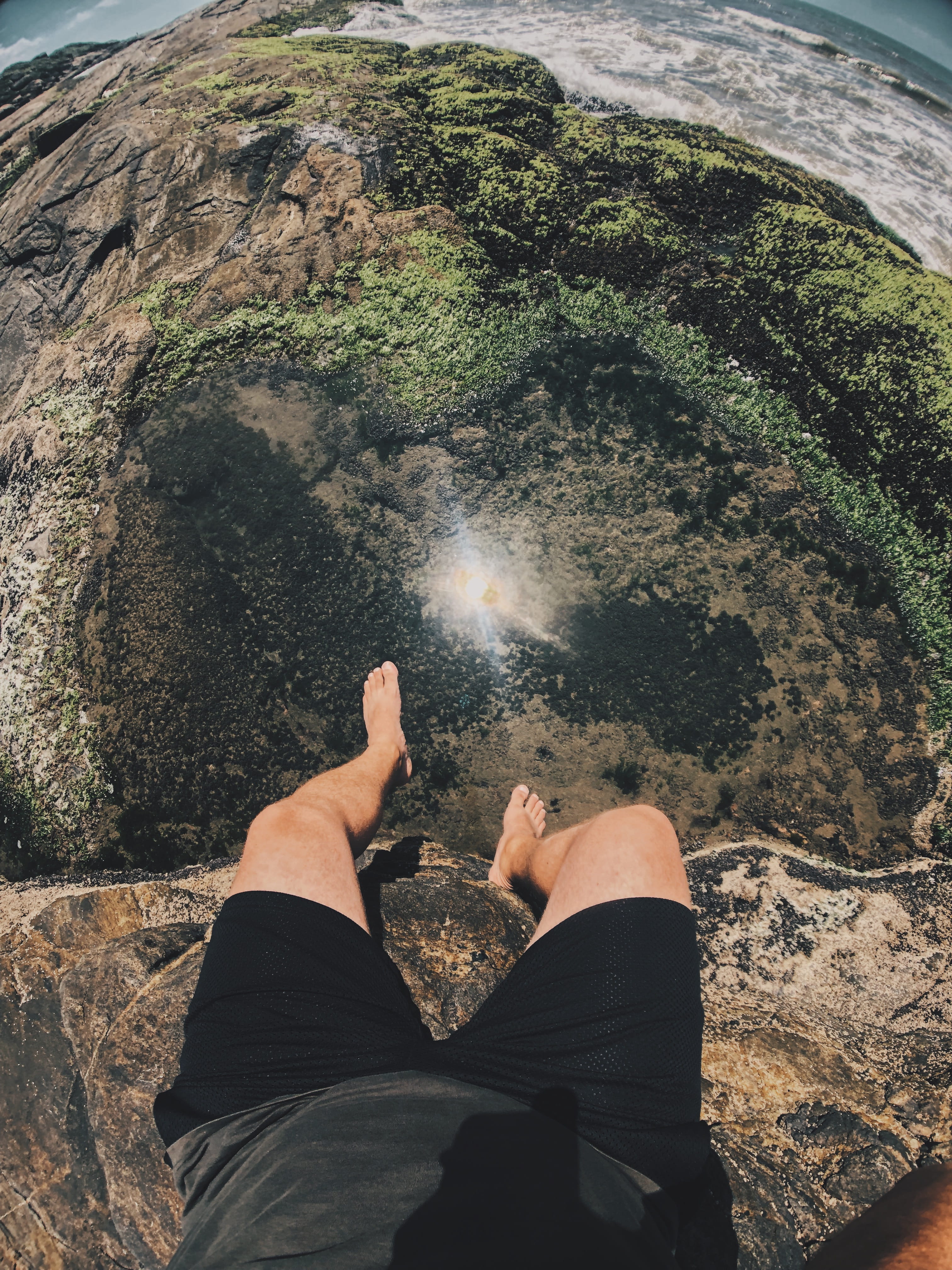 high angle view, daytime, cliff, summer, recreation, sea, mountain, adventure, human leg, outdoors, person, seashore, wear, one person, real people, lifestyles, Phone HD Wallpaper
