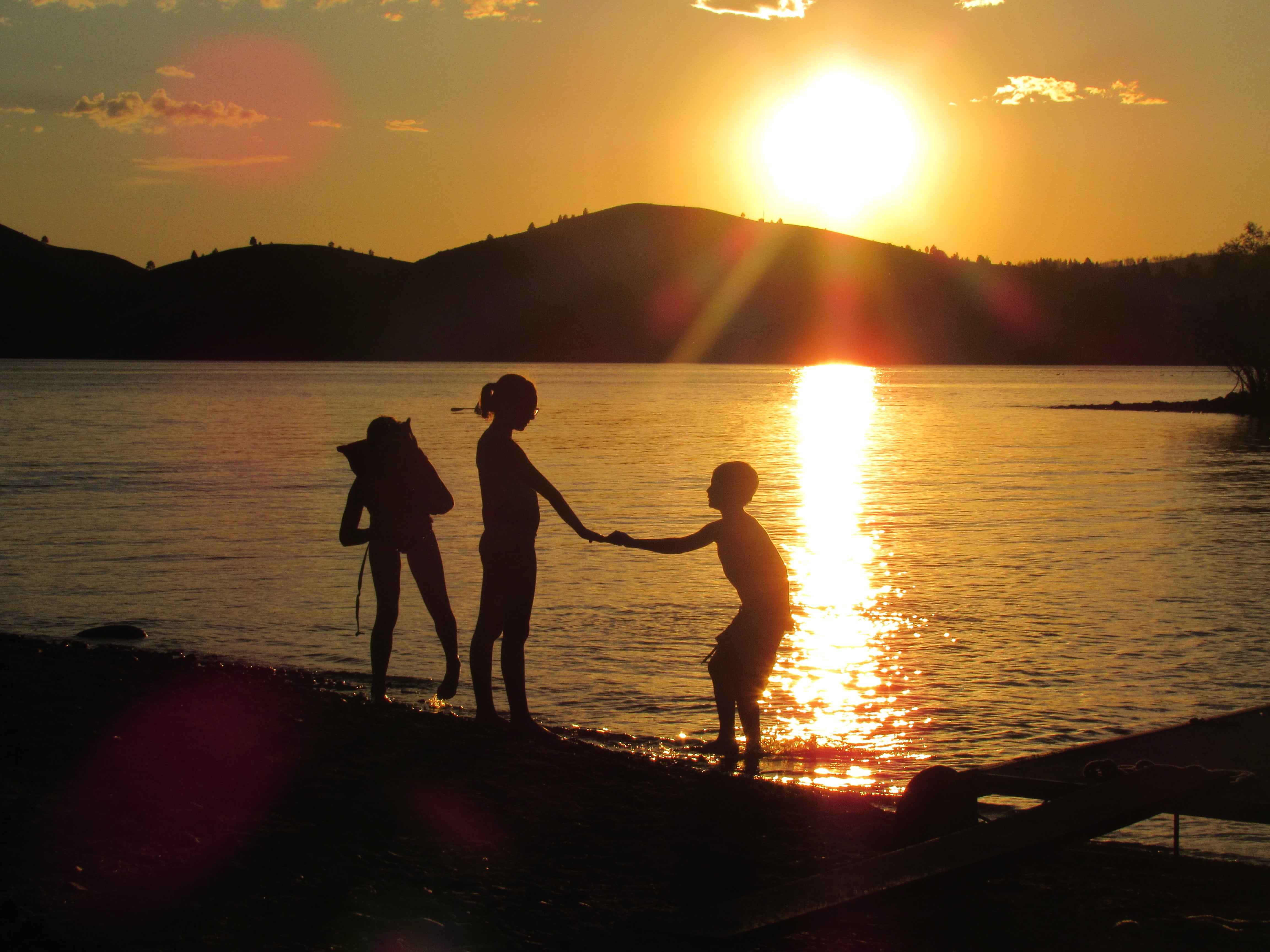 lens flare, silhouette, togetherness, child, sunlight, sun, men, nature, summertime, reflection, real people, young, sunset, cousins, leisure activity, HD Wallpaper