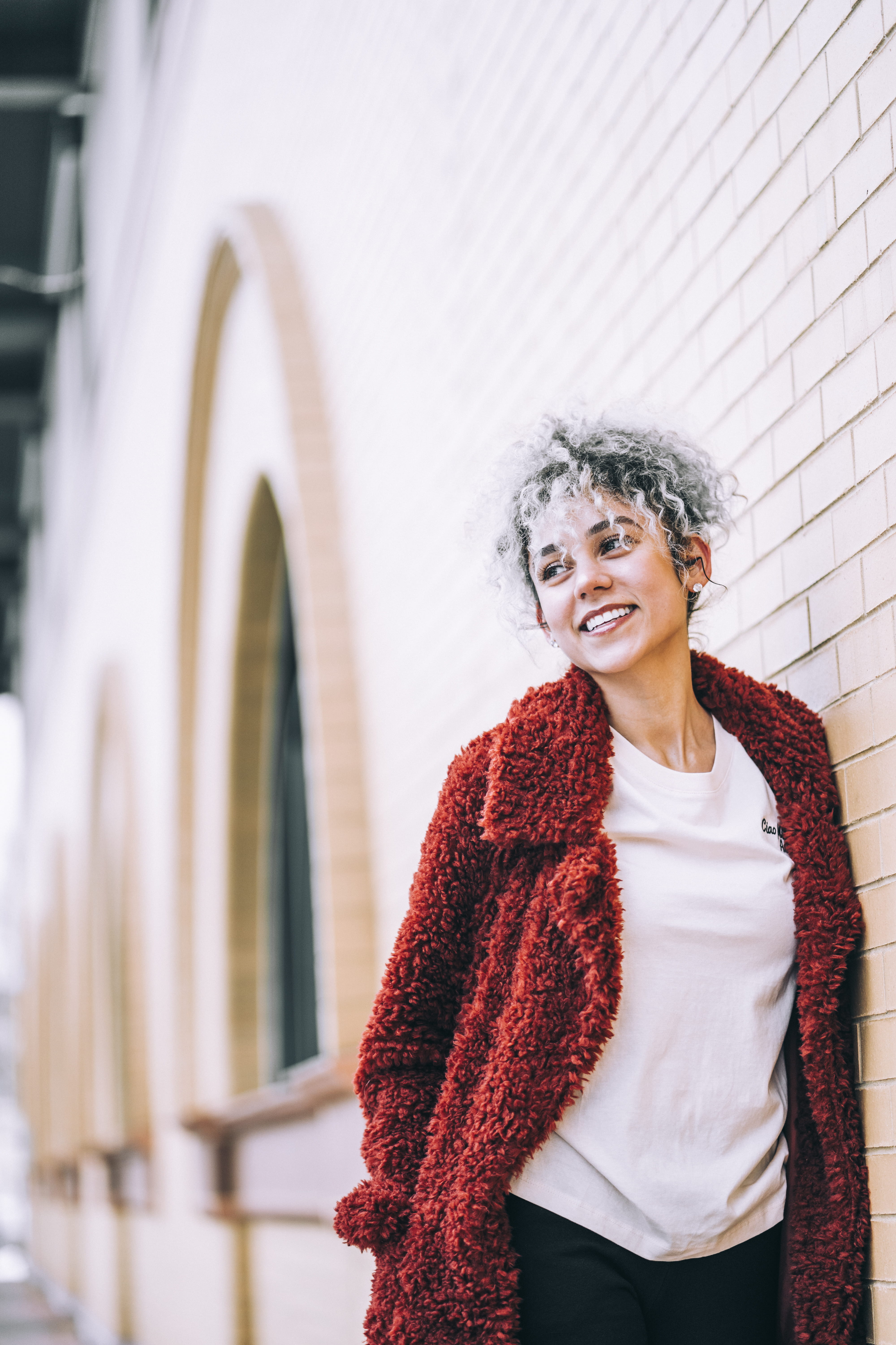 waist up, cardigan, person, turquoise, architecture, chain mail, armor, one person, happiness, hair, navel, sweater, front view, long sleeve, women, real people, Phone HD Wallpaper