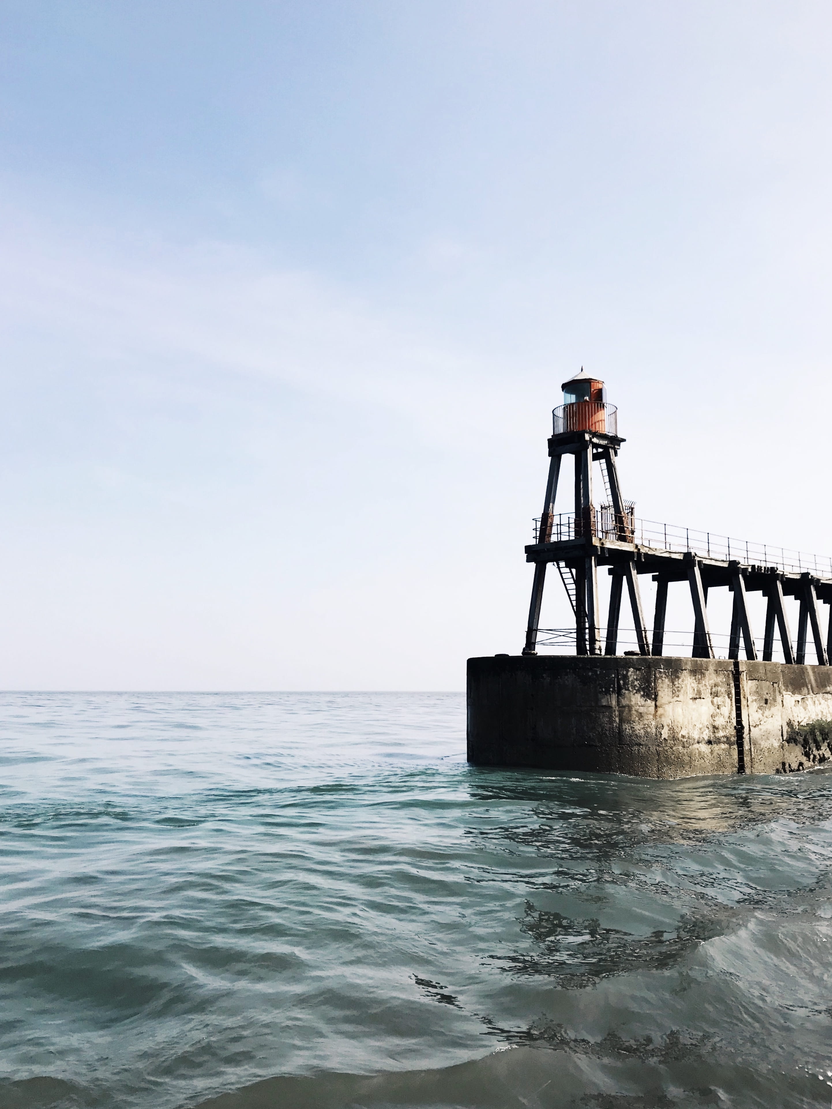 beauty in nature, body, shelter, safety, beside, countryside, surface, day, no people, horizon, port, water, ocean, tower, tranquil scene, outdoors, architecture, Phone HD Wallpaper