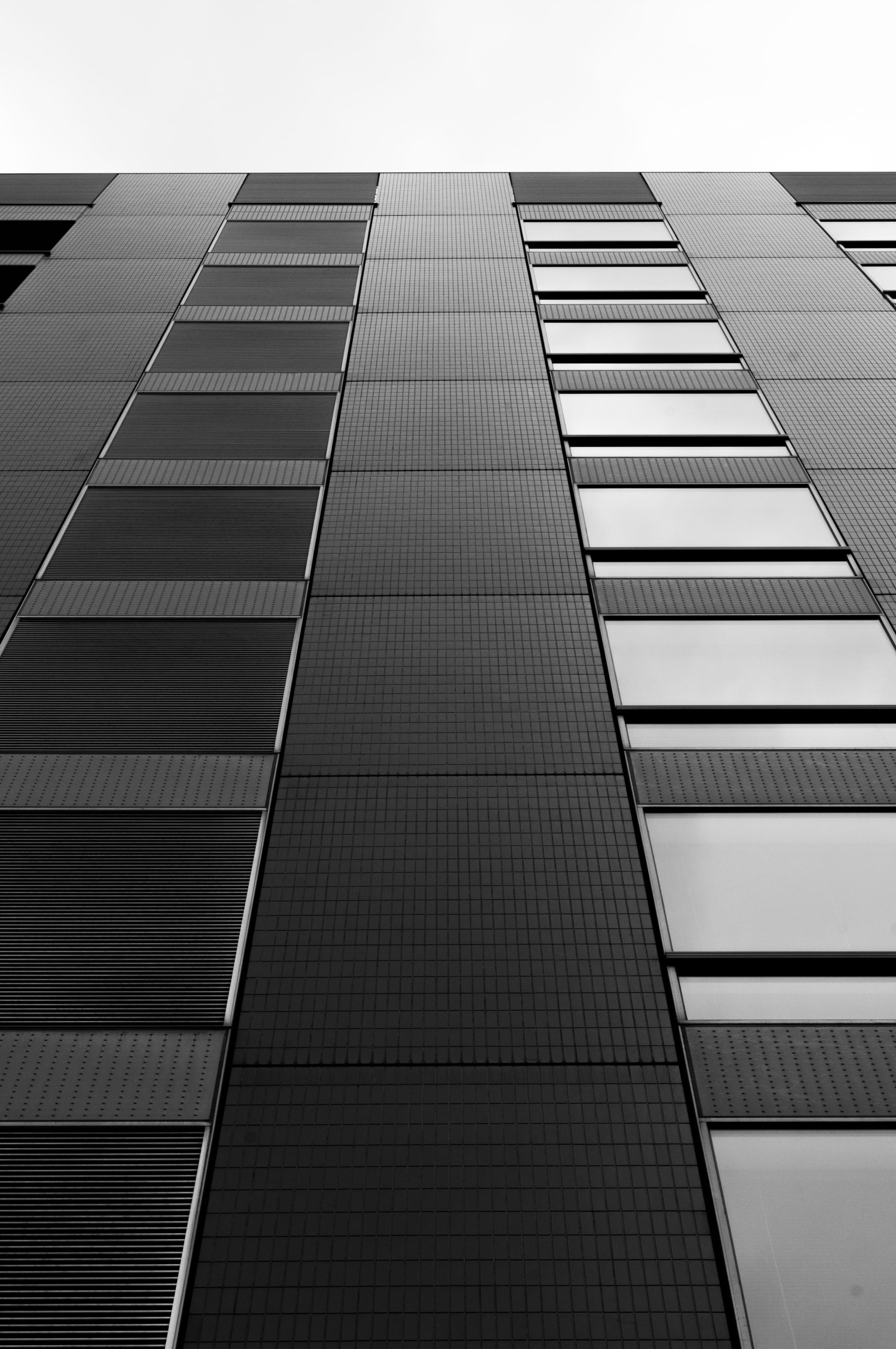 glass - material, black and white, minimal, geometry, building exterior, no people, urban, built structure, low angle view, japan, glass, symetry, skyscraper, Phone HD Wallpaper