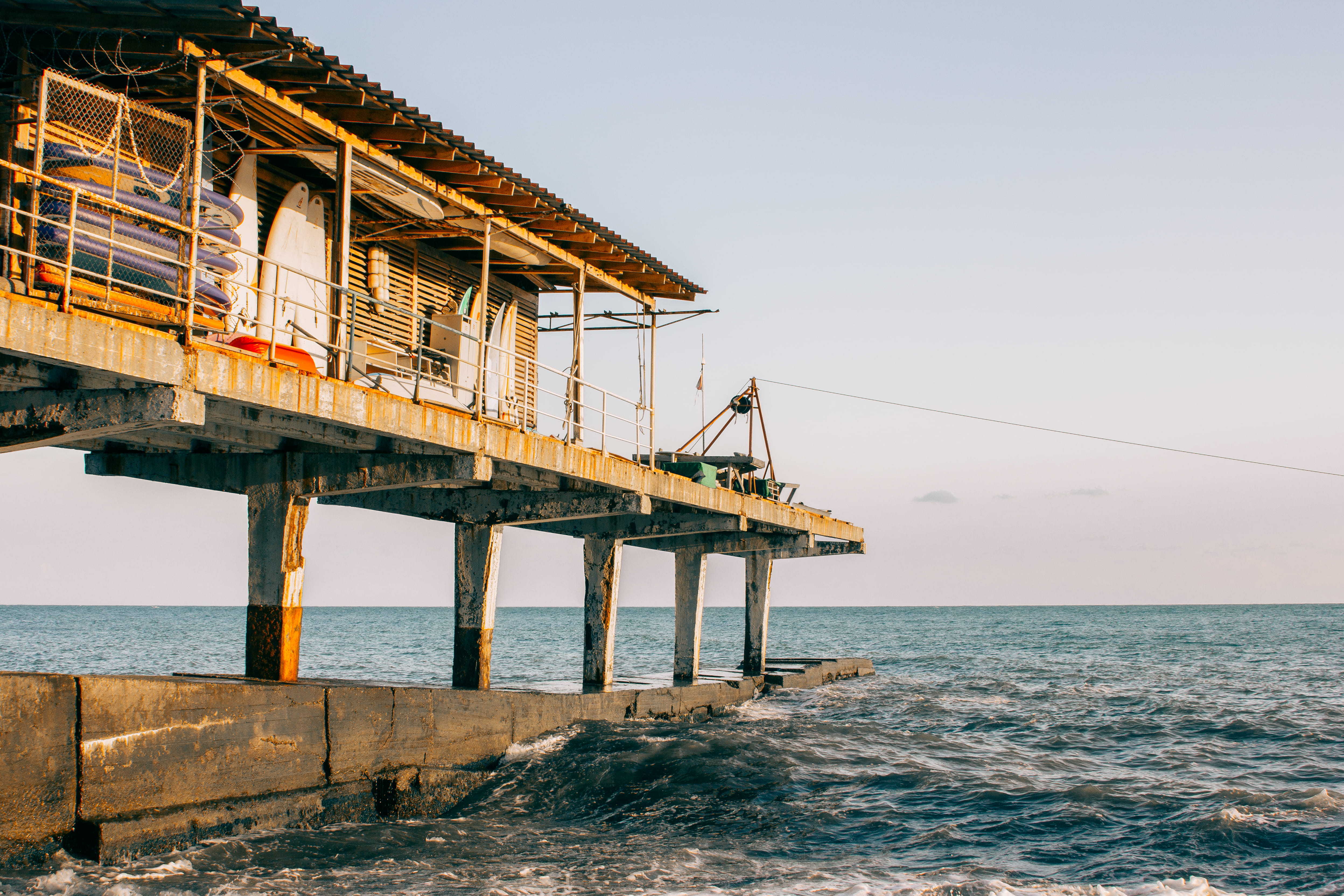 outdoors, sea, horizon over water, building, pollars, brown, idyllic, scenics - nature, russia, pier, water, ocean, clear sky, 4K, nature, built structure, HD Wallpaper