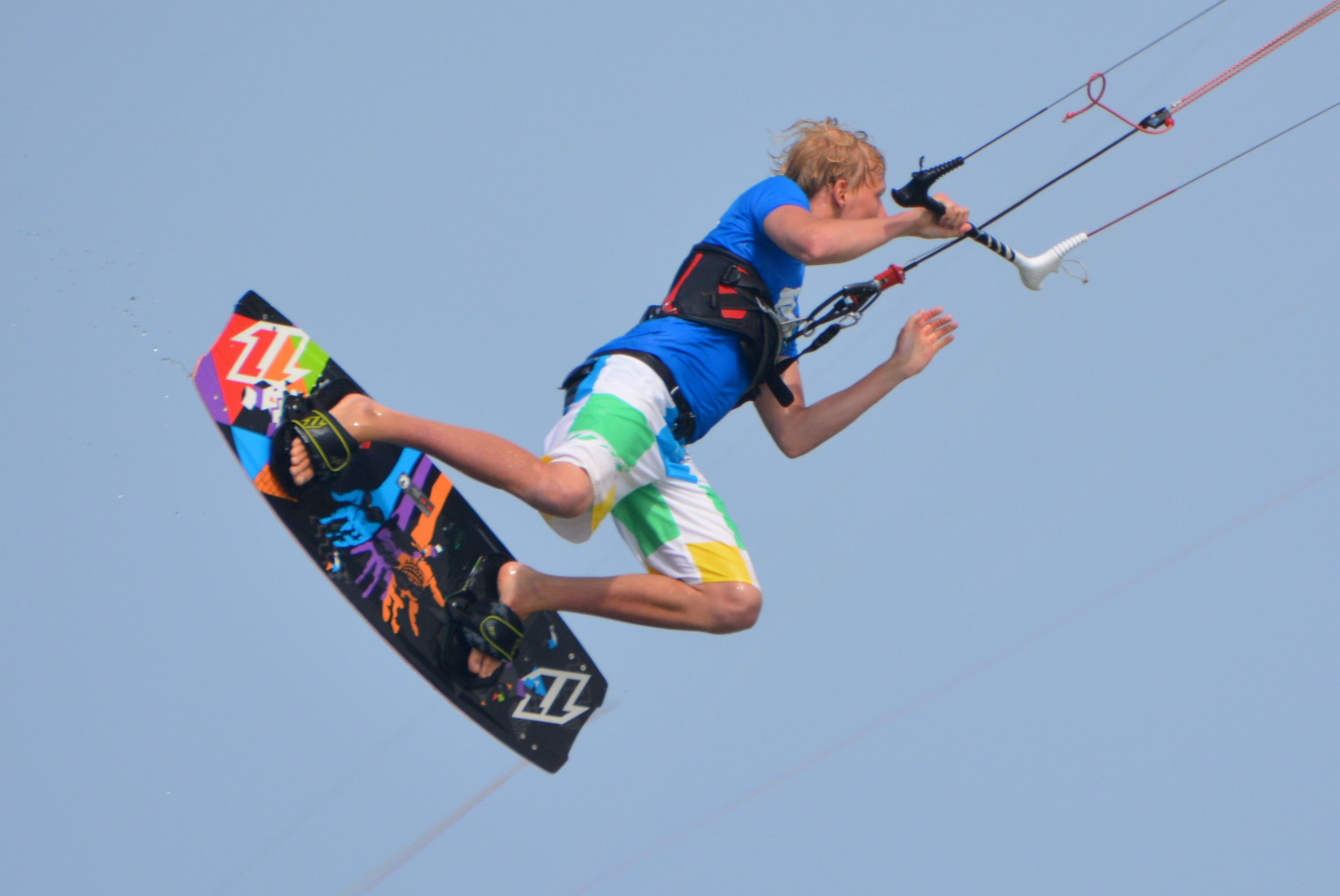 low angle view, people, adolescence, surf, human limb, boys, motion, blue, men, sky, skill, 2K, mid-air, outdoors, one person, leisure activity, jumping, HD Wallpaper