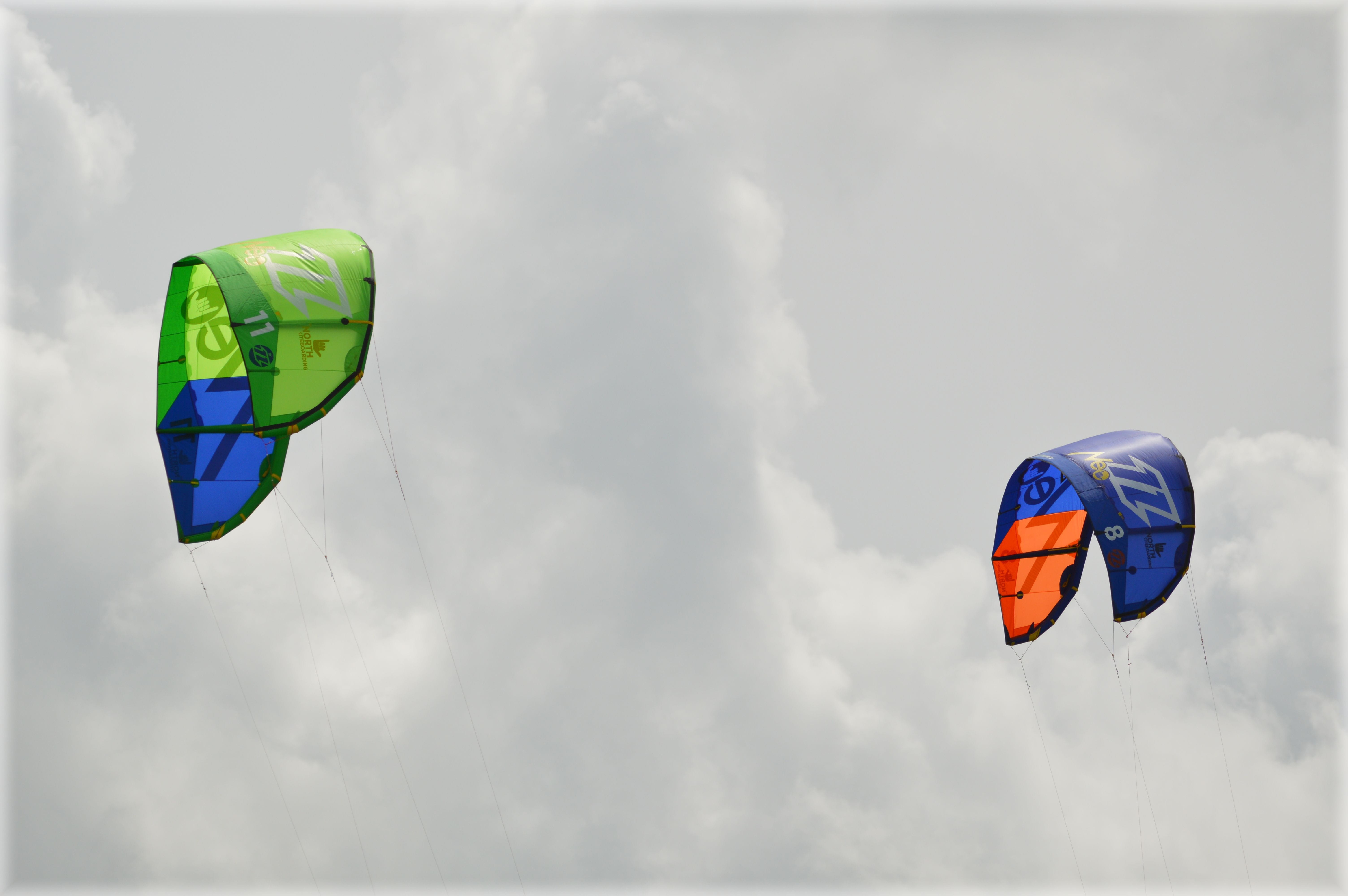 paragliding, adventure, wind, nature, holland, day, 5K, flag, sailing, kitesurfing, freedom, windsurfing, sea, cloud - sky, low angle view, sky, culture, HD Wallpaper
