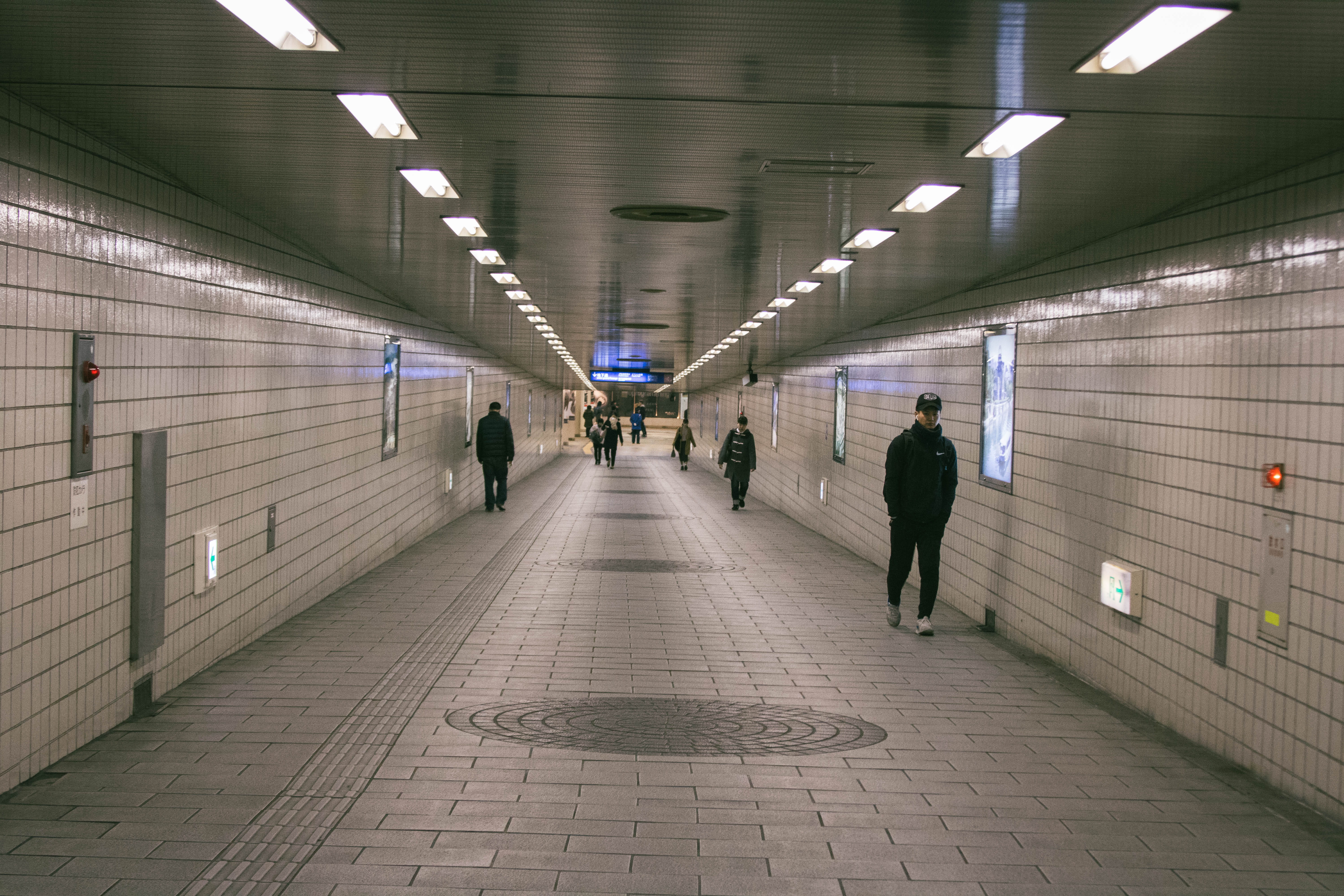 subway, japan, tile, illuminated, 5K, the way forward, diminishing perspective, tunnel, fluorescent light, underpass, light, real people, person, walking, HD Wallpaper