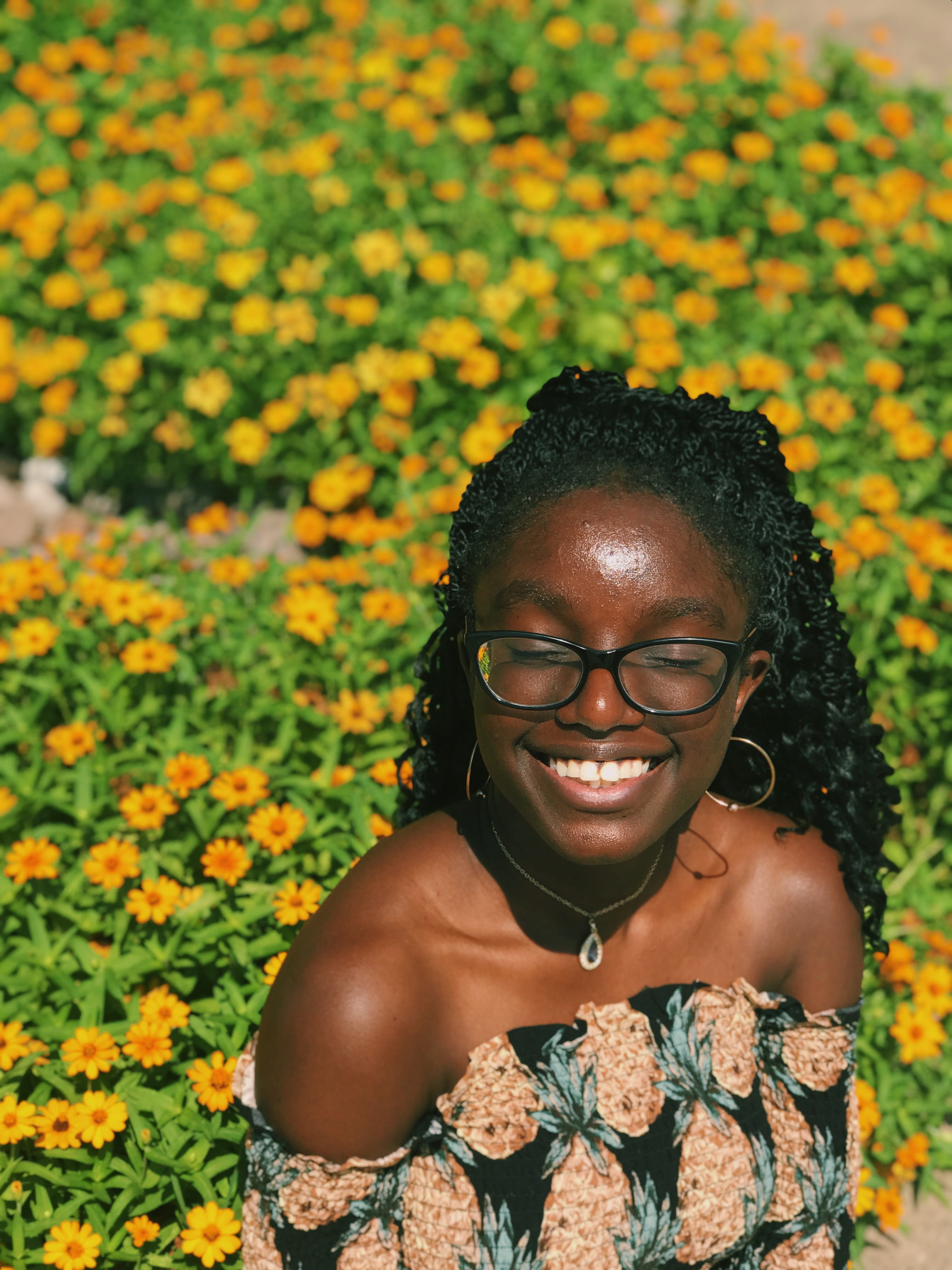 flower, happiness, young women, glasses, 4K, sunny, sun, gate 1, smiling, nature, black, yellow, leisure activity, bright, women, hairstyle, flowering plant, Phone HD Wallpaper