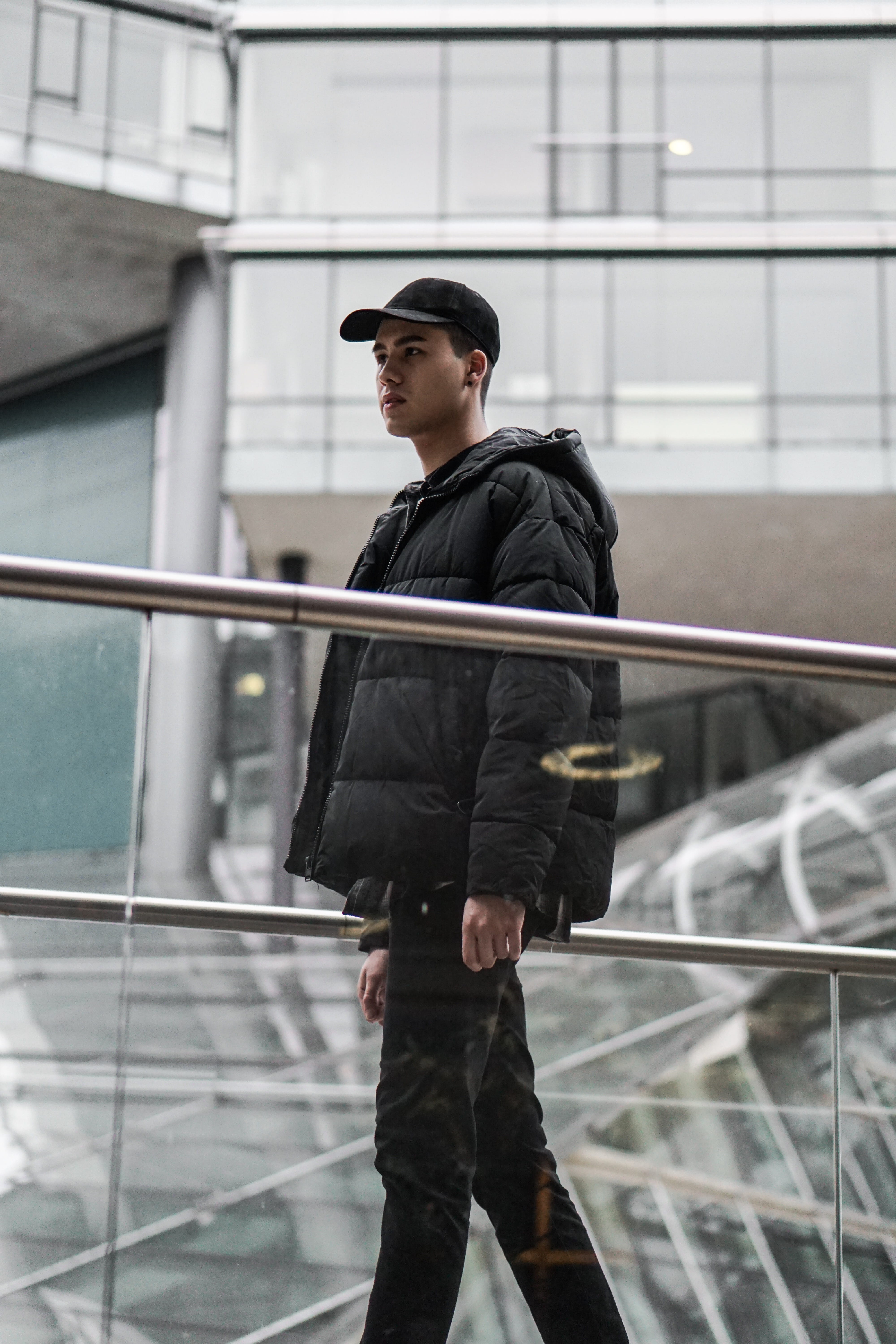 5K, fashion, railing, overcoat, walking, person, three quarter length, man, looking away, cap, leisure activity, outdoors, coat, young men, lifestyles, Phone HD Wallpaper