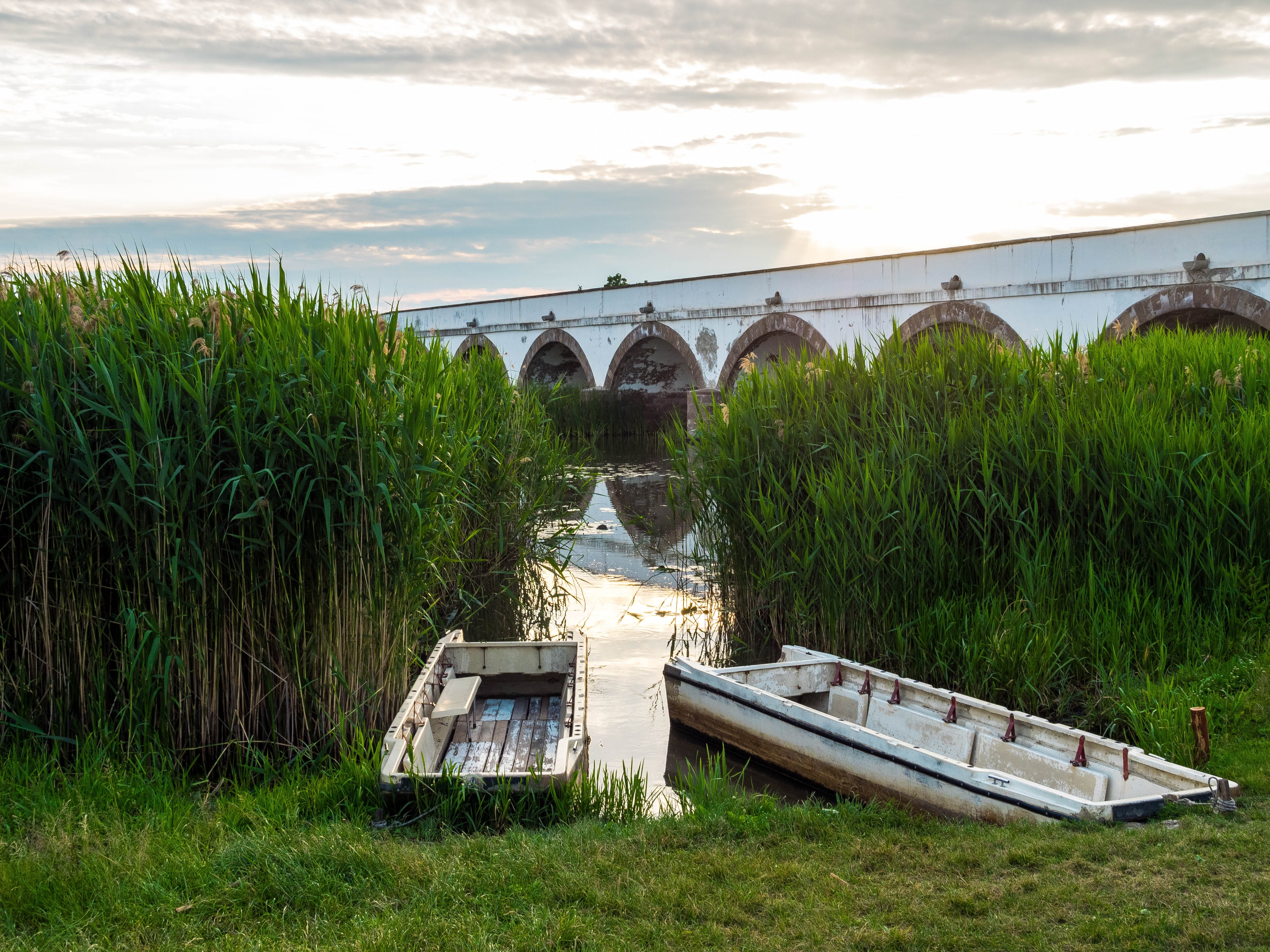 day, mirroring, plant, channel, nature, waters, boats, 4K, bridge, no people, summer, bridge - man made structure, sky, clouds, hortobagy, rowing boat, HD Wallpaper