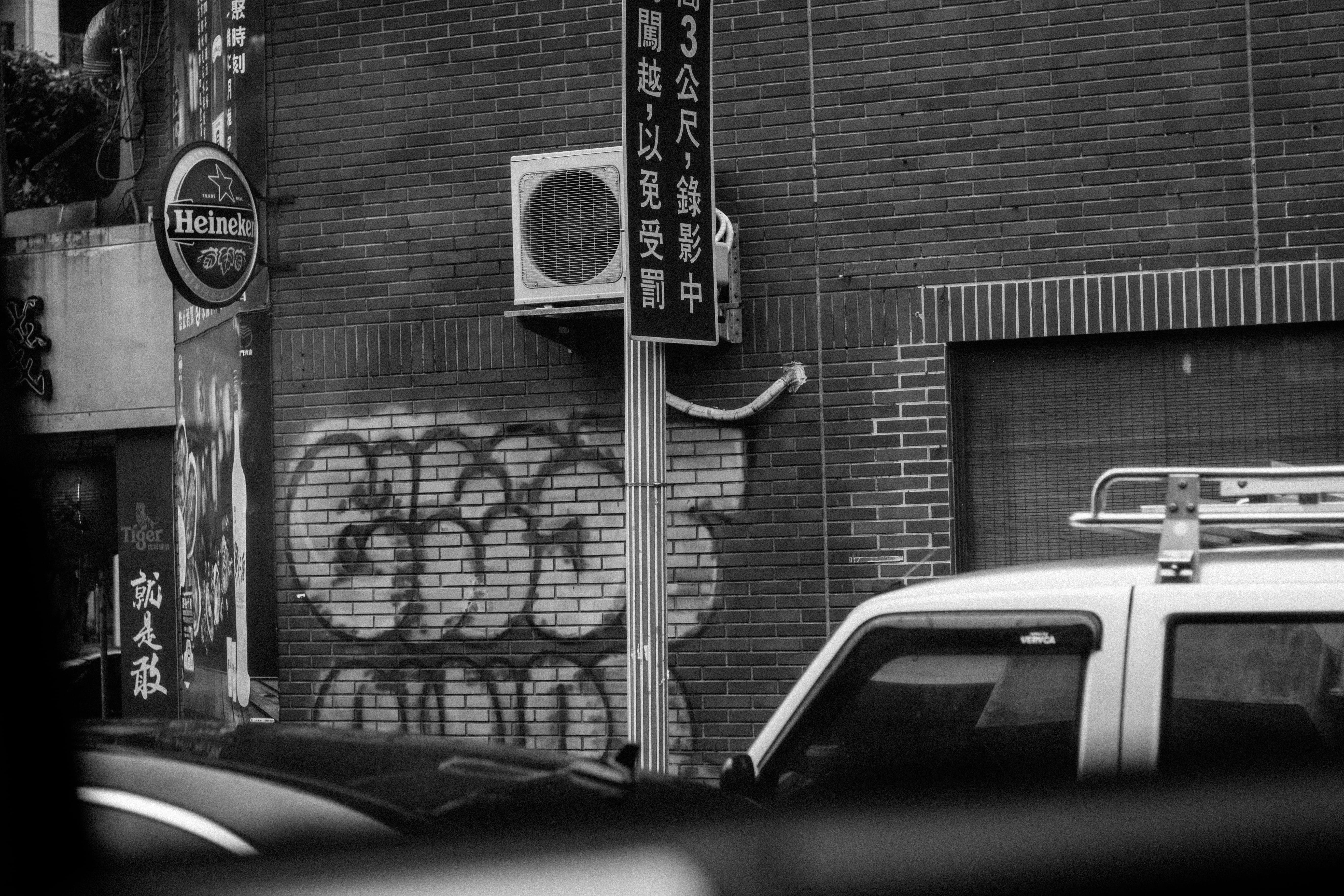 motor vehicle, wall, land vehicle, city, text, outdoors, monochrome, taiwan, black and white, no people, architecture, cool, brick, transportation, 5K, HD Wallpaper