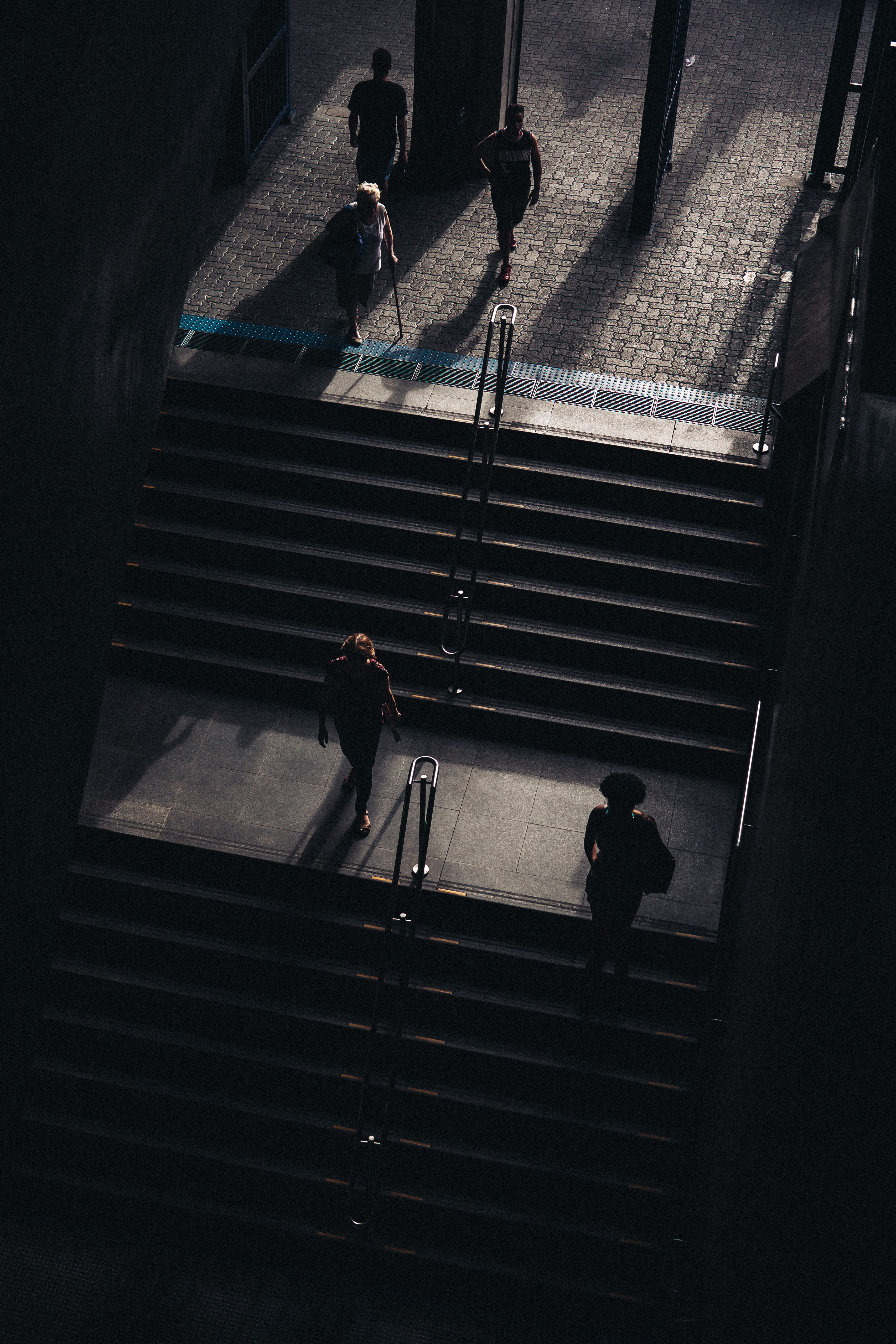 pavement, people, architecture, indoors, sunlight, real people, shadow, city, handrails, walking, urban, stairs, 5K, photography, lifestyles, wear, male, Phone HD Wallpaper