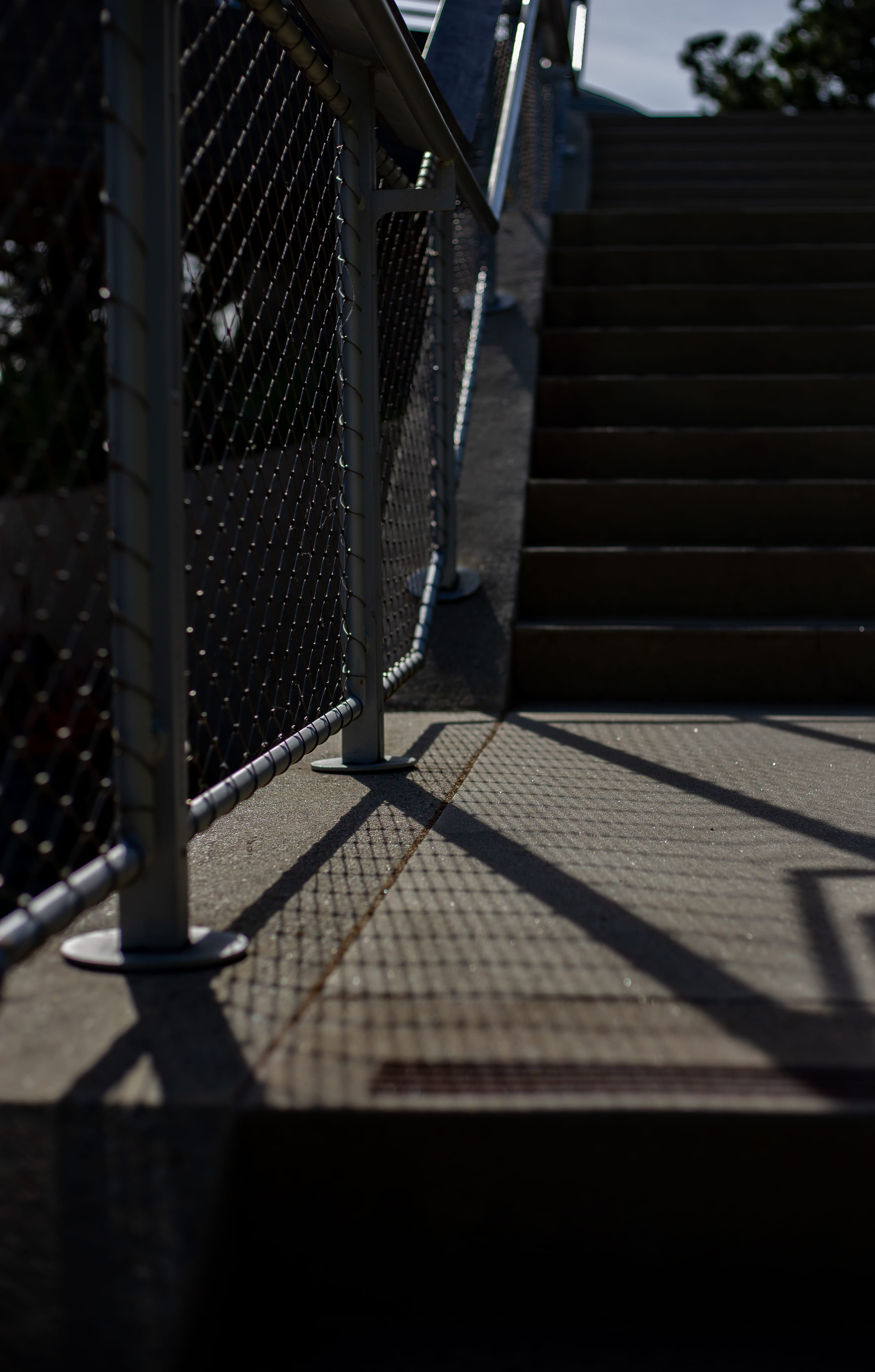 floor, footpath, shadows, no people, security, metal, lighting, building exterior, sunlight, flooring, gate, stairs, apparel, city, built structure, jar, Phone HD Wallpaper