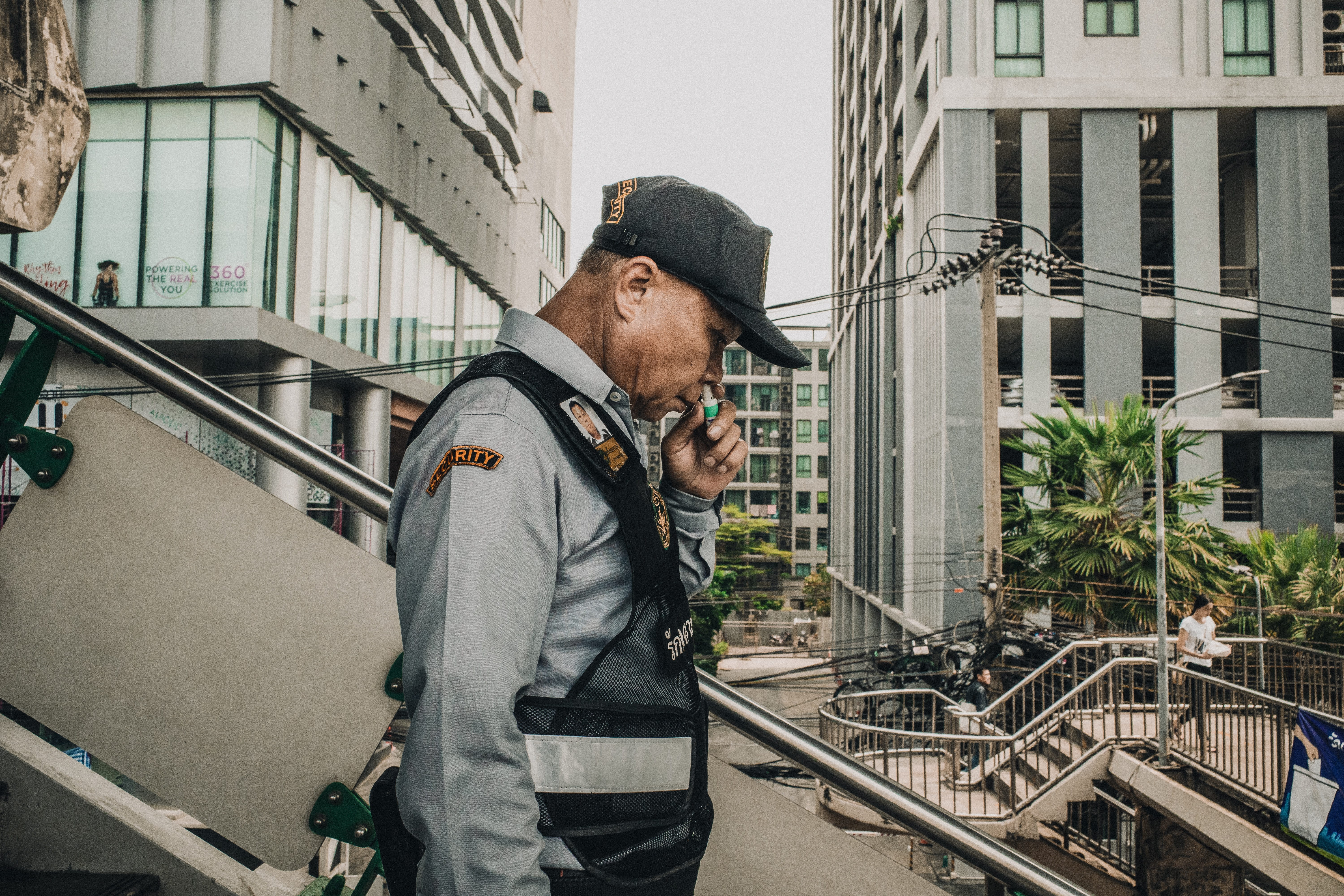 clothing, railing, banister, one person, 5K, shirt, architecture, human, town, outdoors, building, technology, person, fireman, hat, building exterior, HD Wallpaper